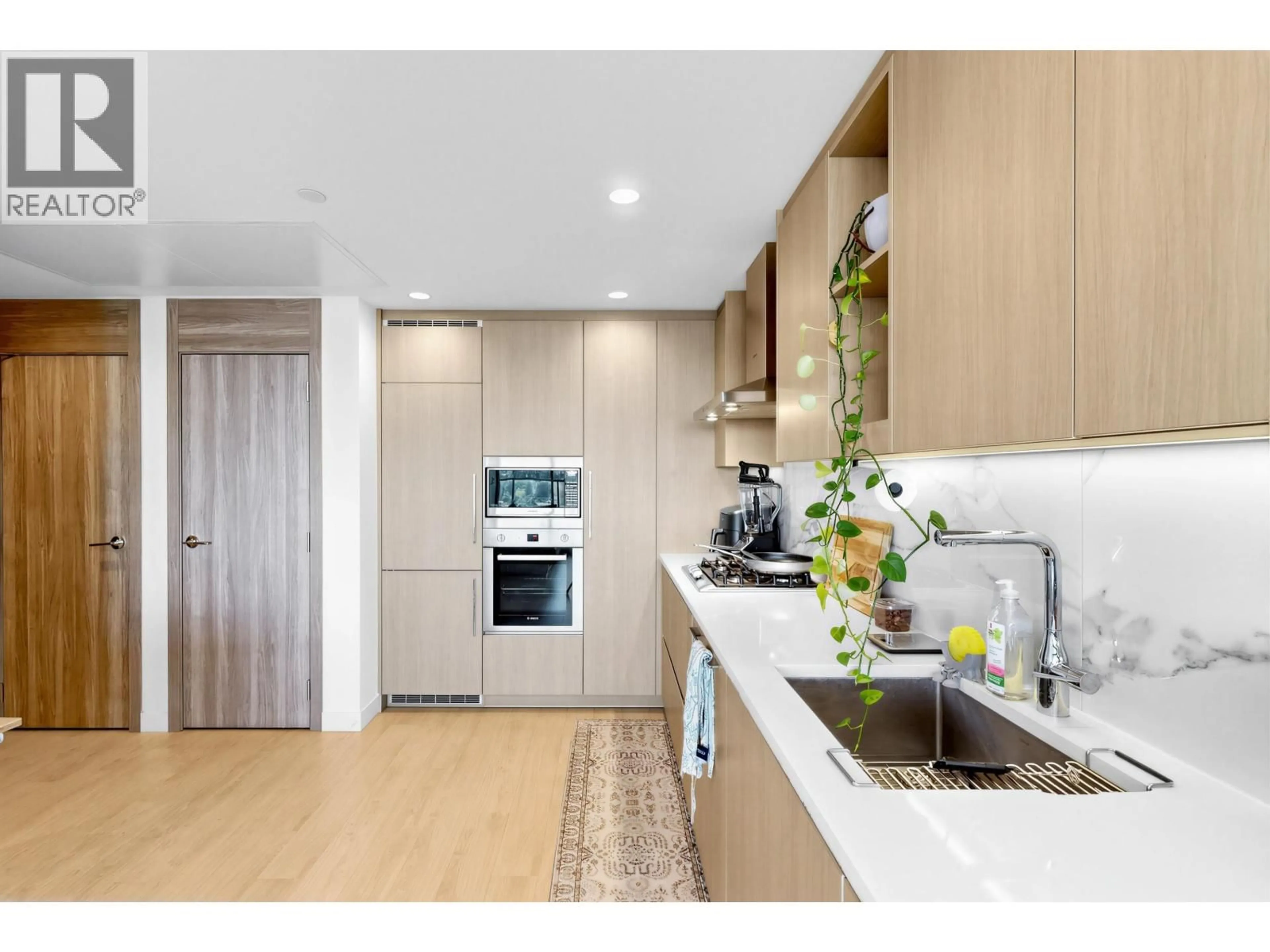 Open concept kitchen, wood/laminate floor for 3301 - 4890 LOUGHEED HIGHWAY, Burnaby British Columbia V5C0N2