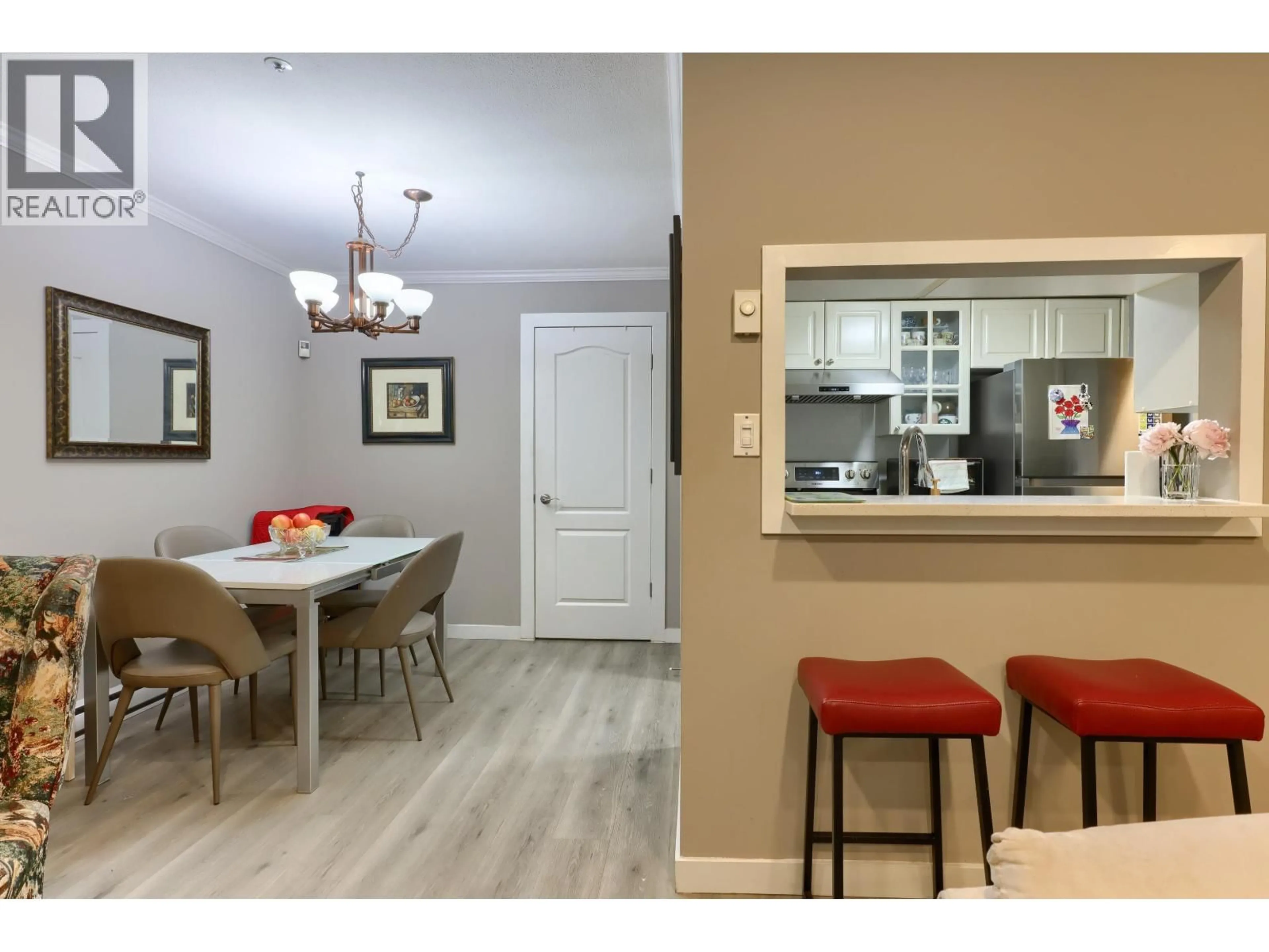 Open concept kitchen, wood/laminate floor for 17 - 2885 KENT AVENUE NORTH, Vancouver British Columbia V5S3T9