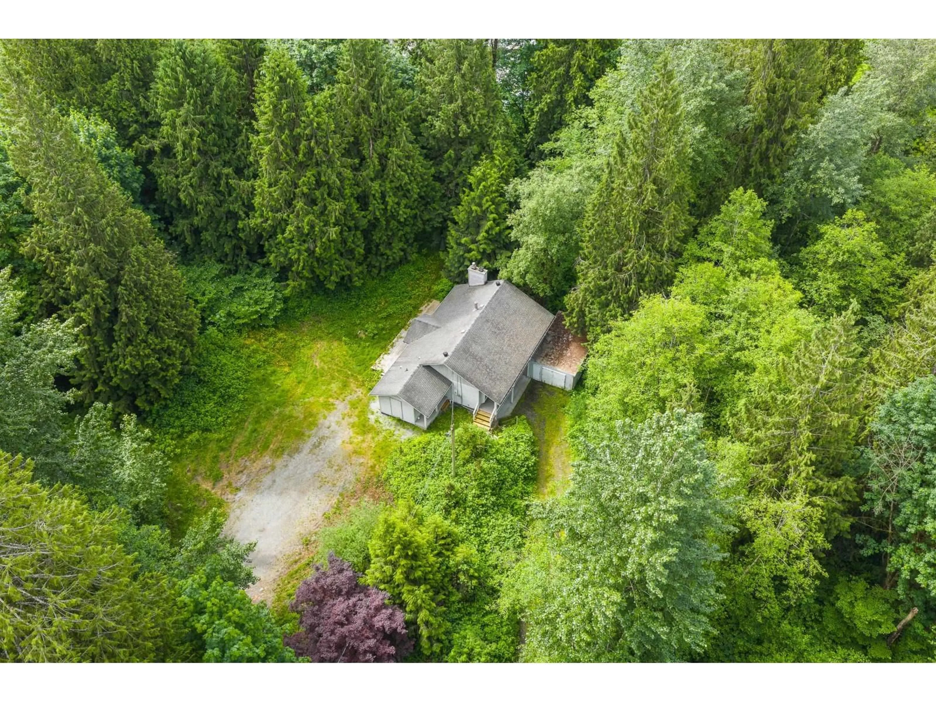 A pic from outside/outdoor area/front of a property/back of a property/a pic from drone, forest/trees view for 9232 FARRINGTON STREET, Mission British Columbia V4S1J6