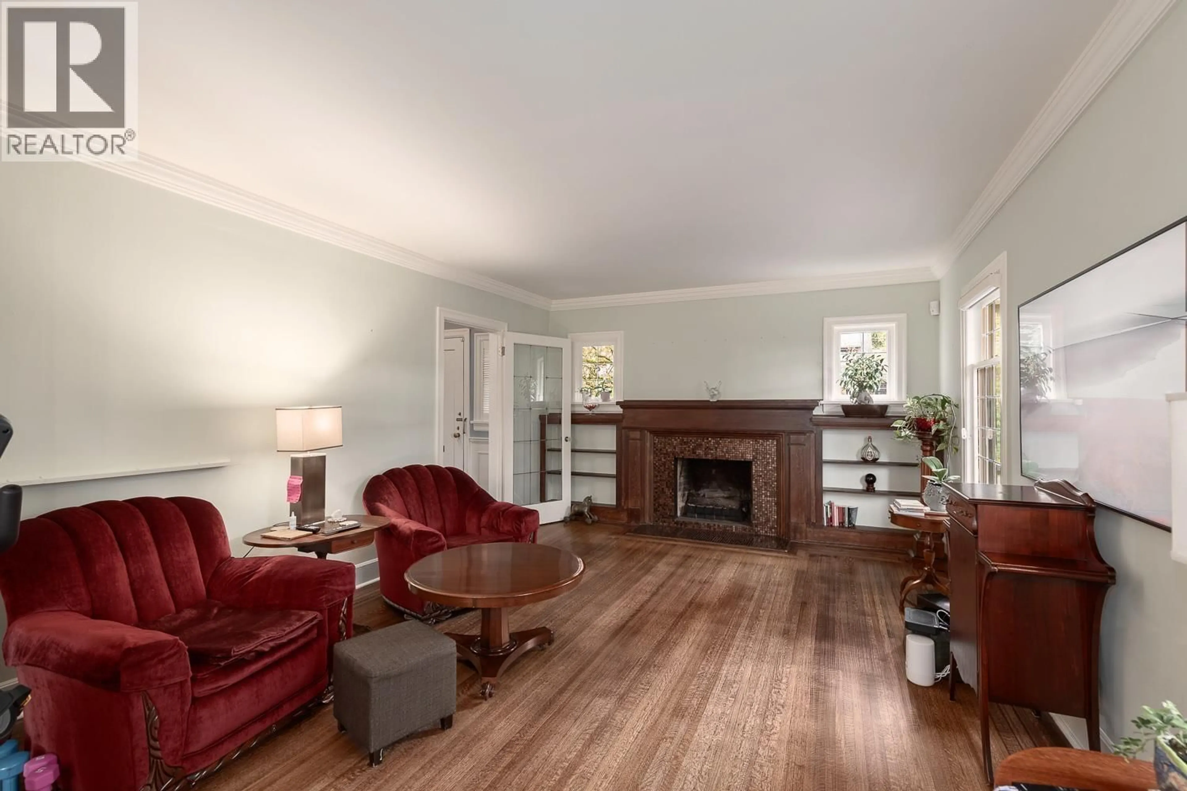 Living room with furniture, wood/laminate floor for 6137 MCCLEERY STREET, Vancouver British Columbia V6N1G3
