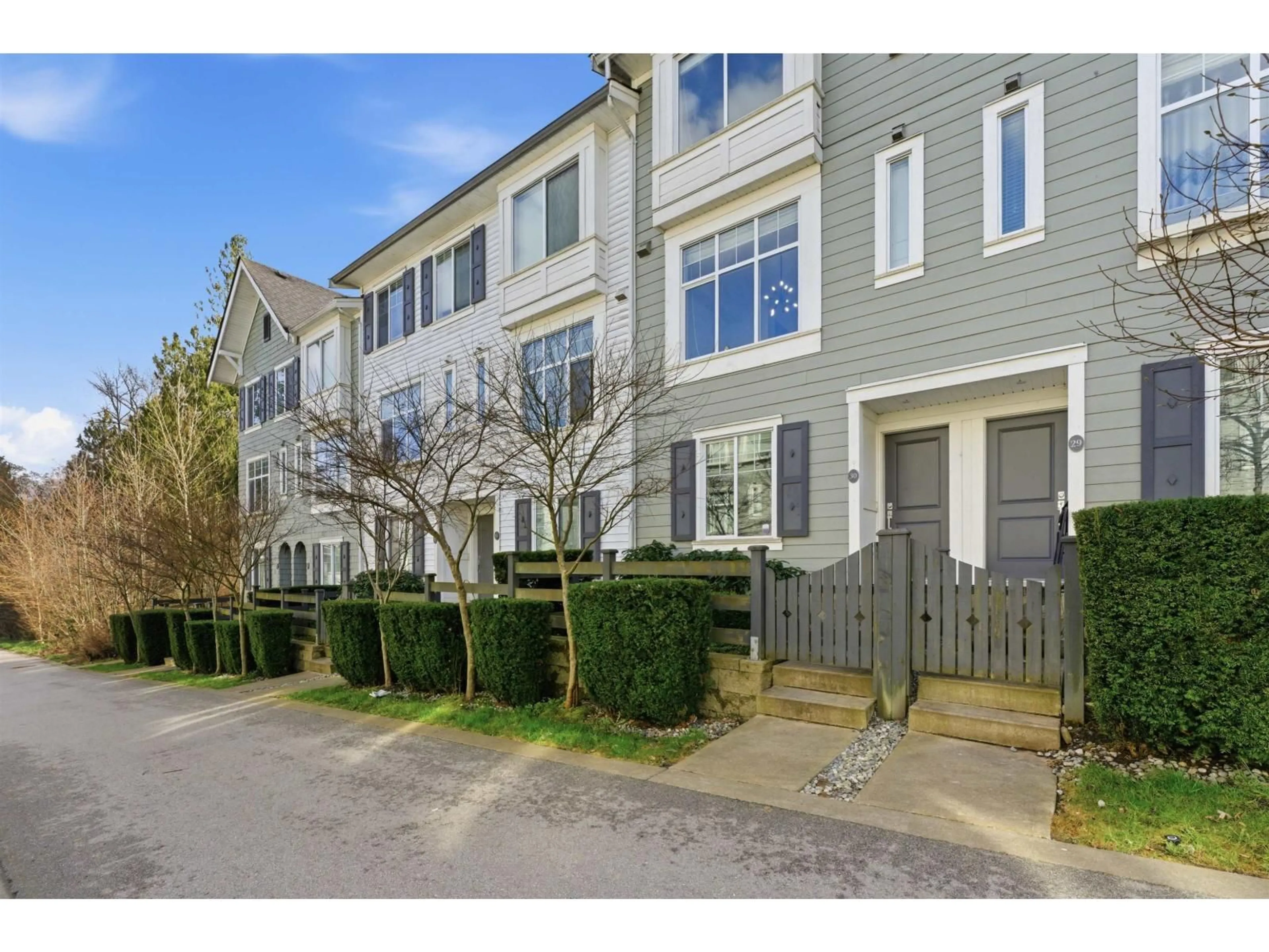 A pic from outside/outdoor area/front of a property/back of a property/a pic from drone, street for 30 - 8130 136A STREET, Surrey British Columbia V3W1H9