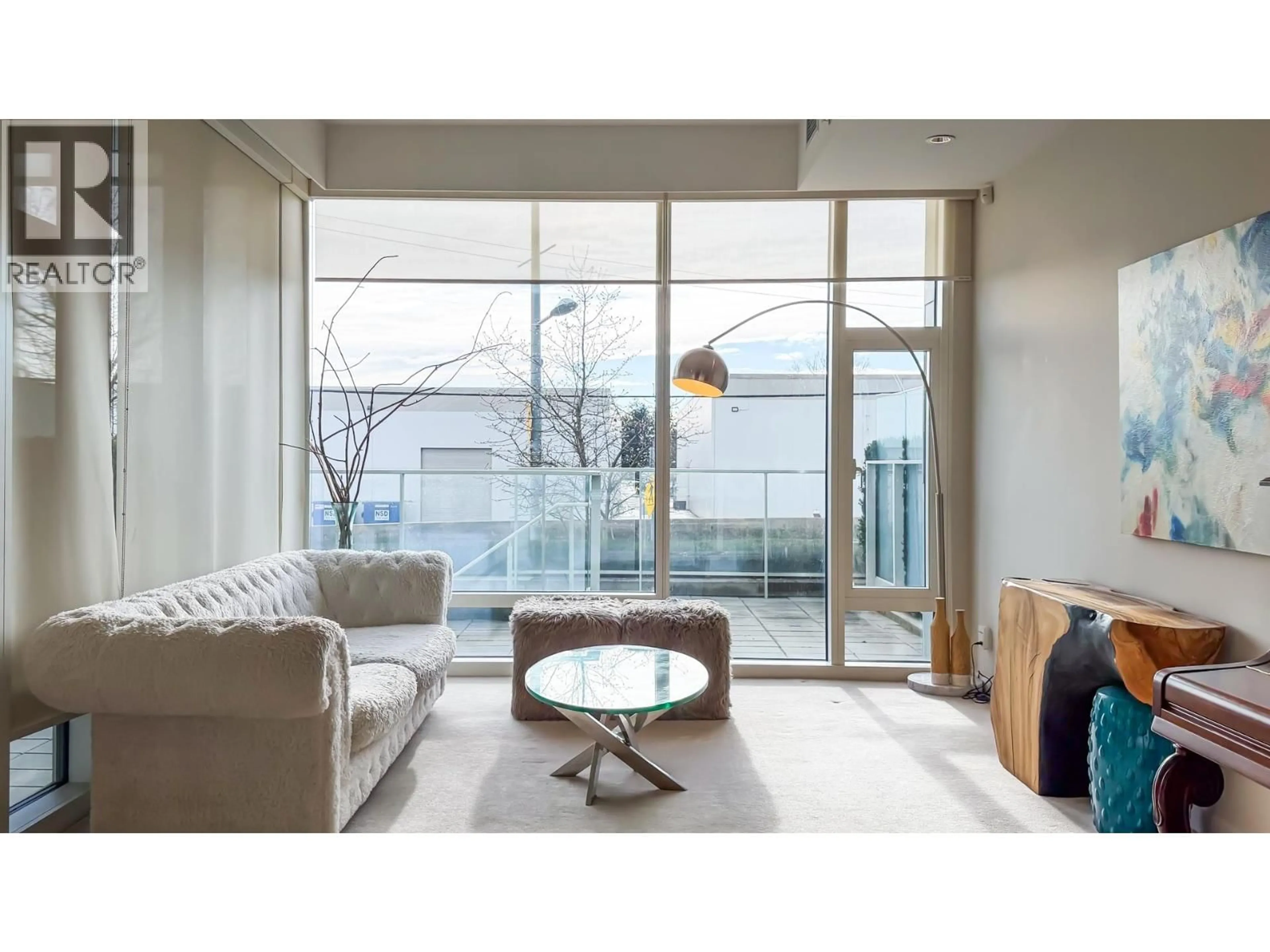 Living room with furniture, unknown for 102 - 5199 BRIDGEHOUSE WAY, Richmond British Columbia V7C0A7