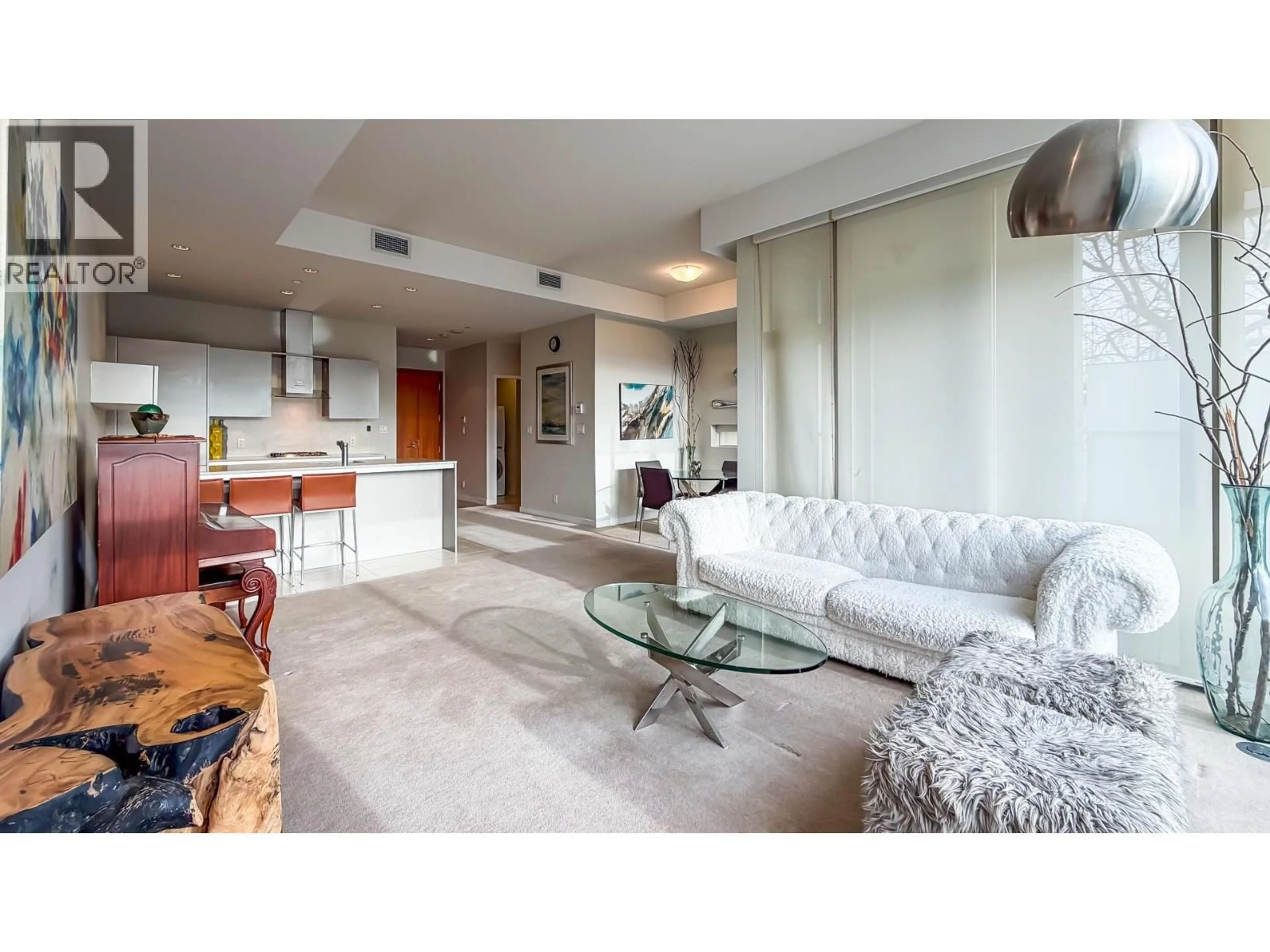 Living room with furniture, unknown for 102 - 5199 BRIDGEHOUSE WAY, Richmond British Columbia V7C0A7