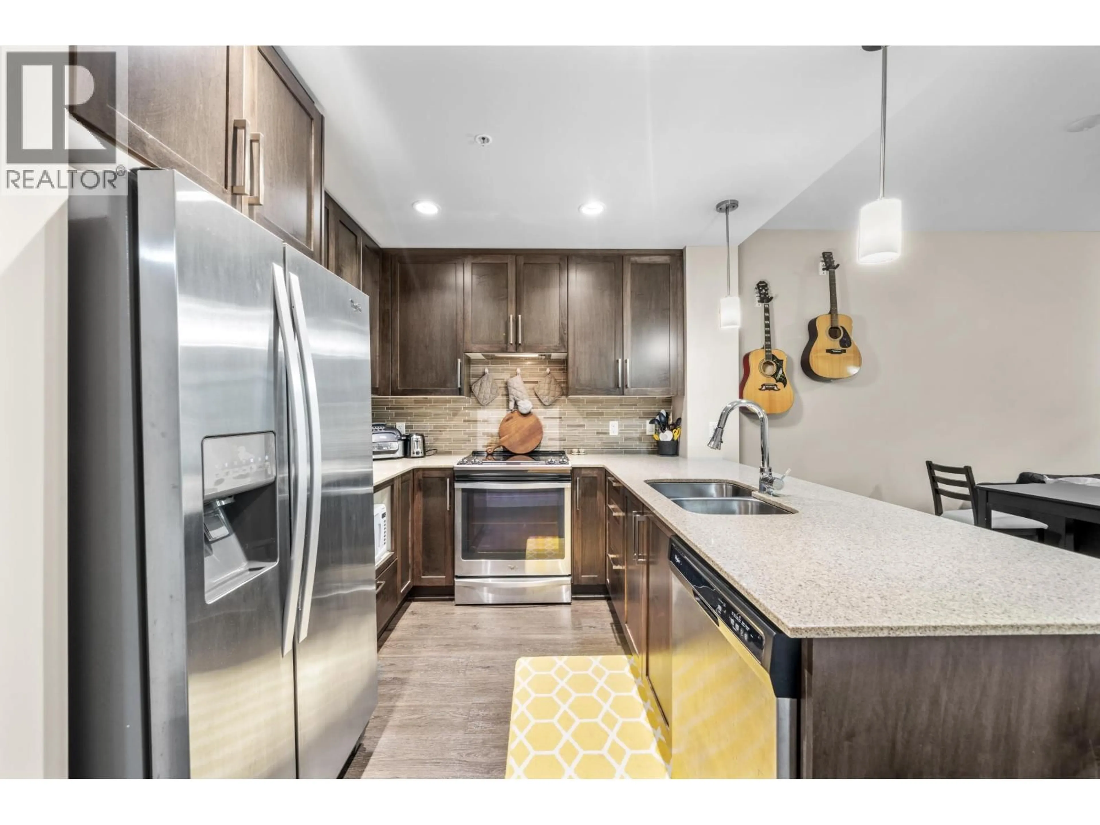 Open concept kitchen, ceramic/tile floor for 407 - 2465 WILSON AVENUE, Port Coquitlam British Columbia V3C0E6