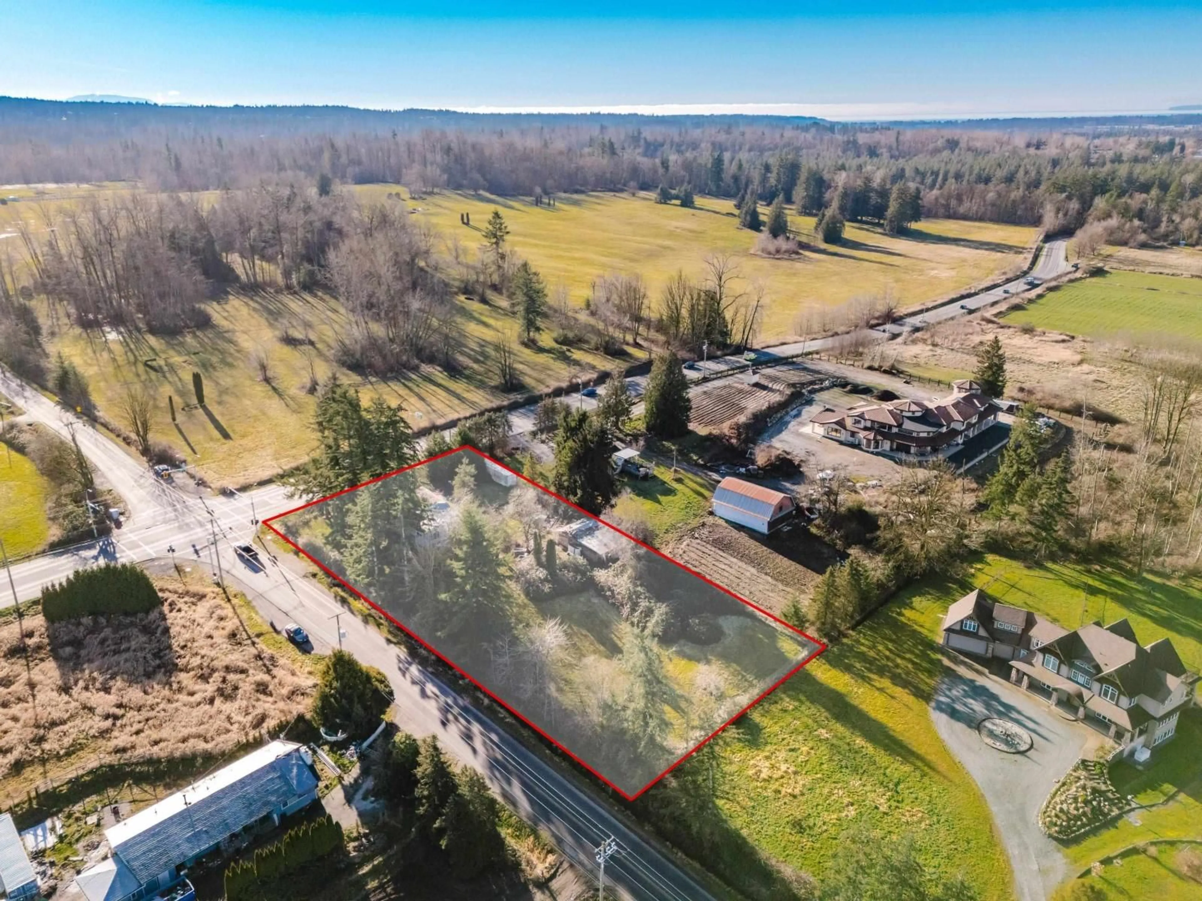 A pic from outside/outdoor area/front of a property/back of a property/a pic from drone, building for 1613 208 STREET, Langley British Columbia V2Z2A7