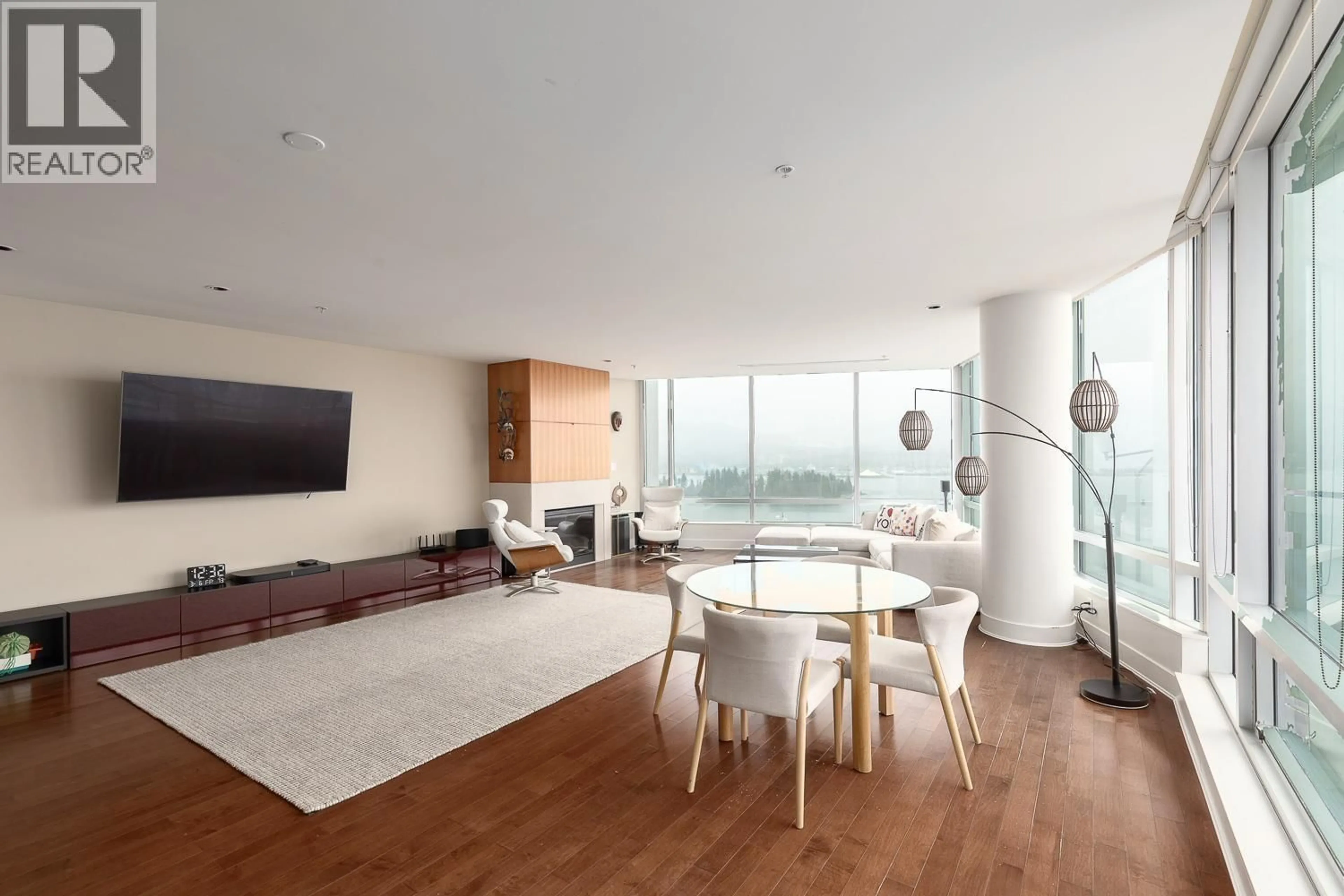 Living room with furniture, wood/laminate floor for 2001 - 1077 CORDOVA STREET, Vancouver British Columbia V6C2C6