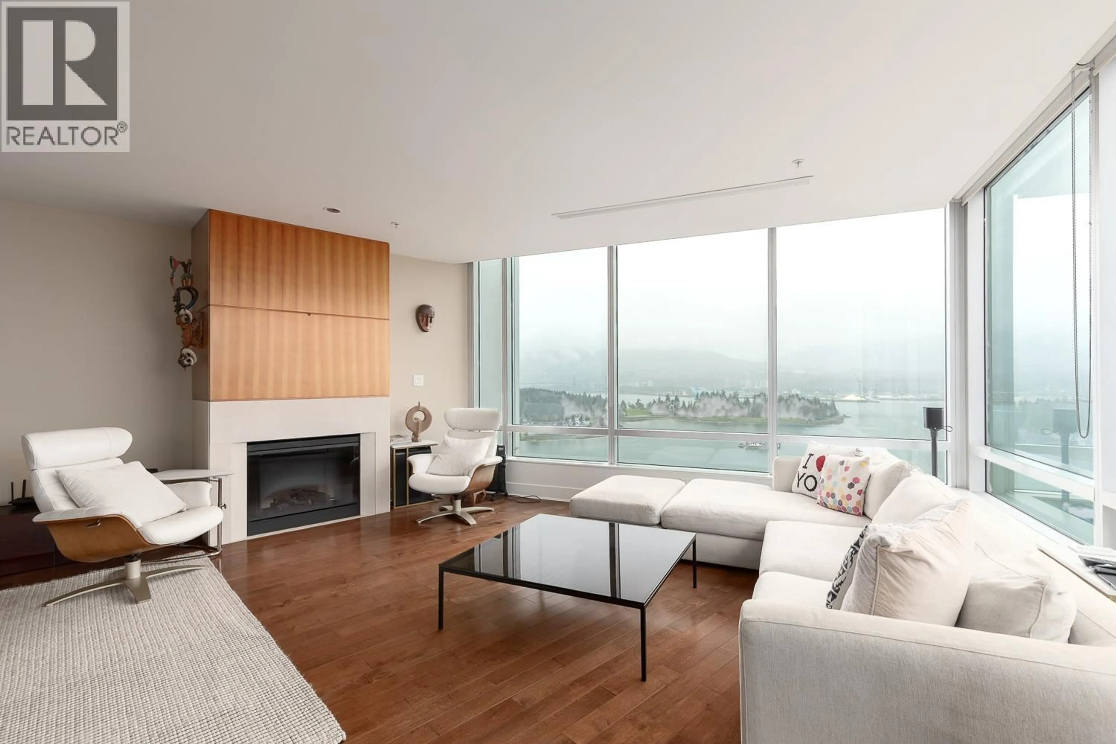 Living room with furniture, wood/laminate floor for 2001 - 1077 CORDOVA STREET, Vancouver British Columbia V6C2C6