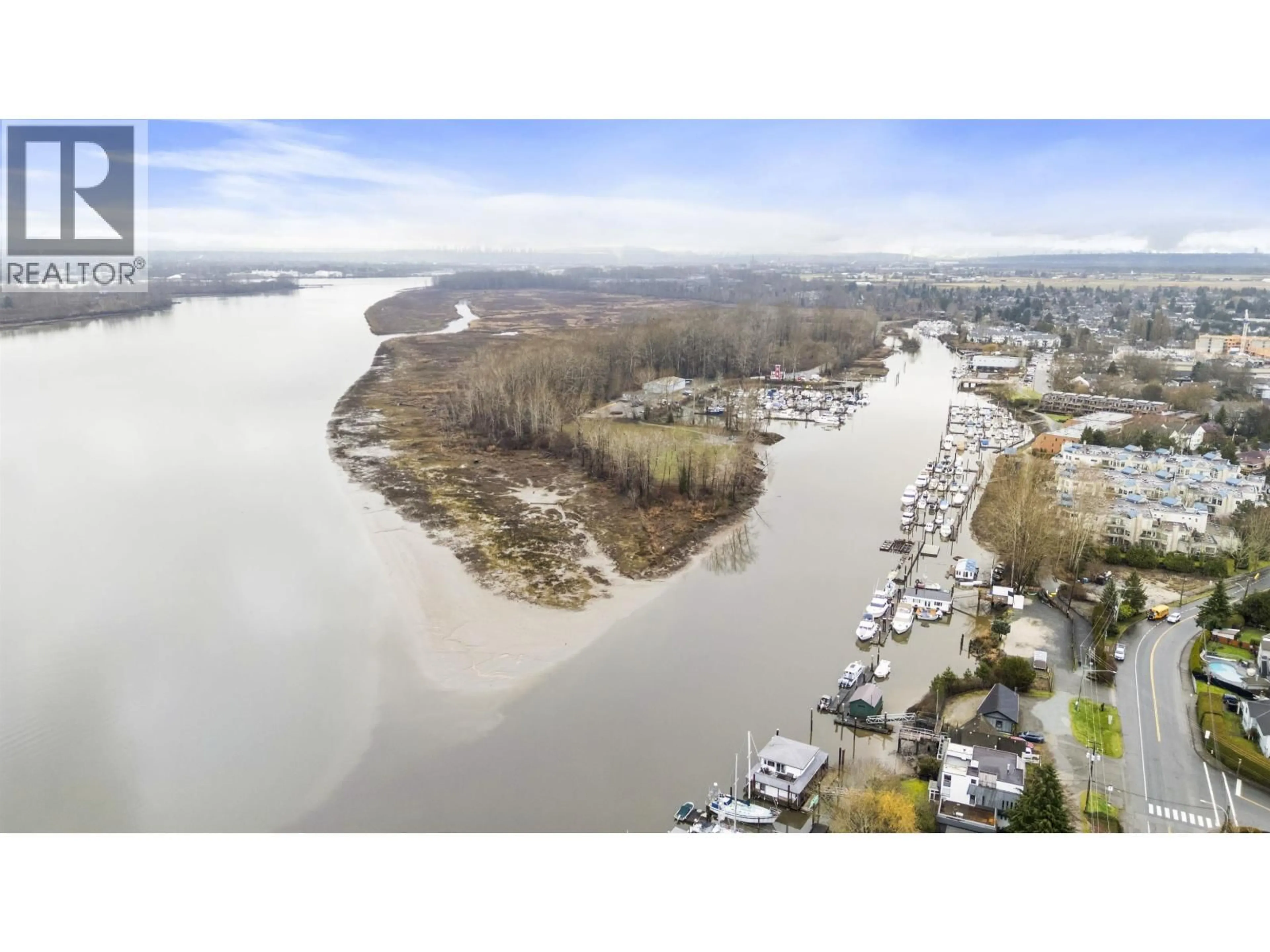 A pic from outside/outdoor area/front of a property/back of a property/a pic from drone, water/lake/river/ocean view for 4515 RIVER ROAD, Delta British Columbia V4K1R9
