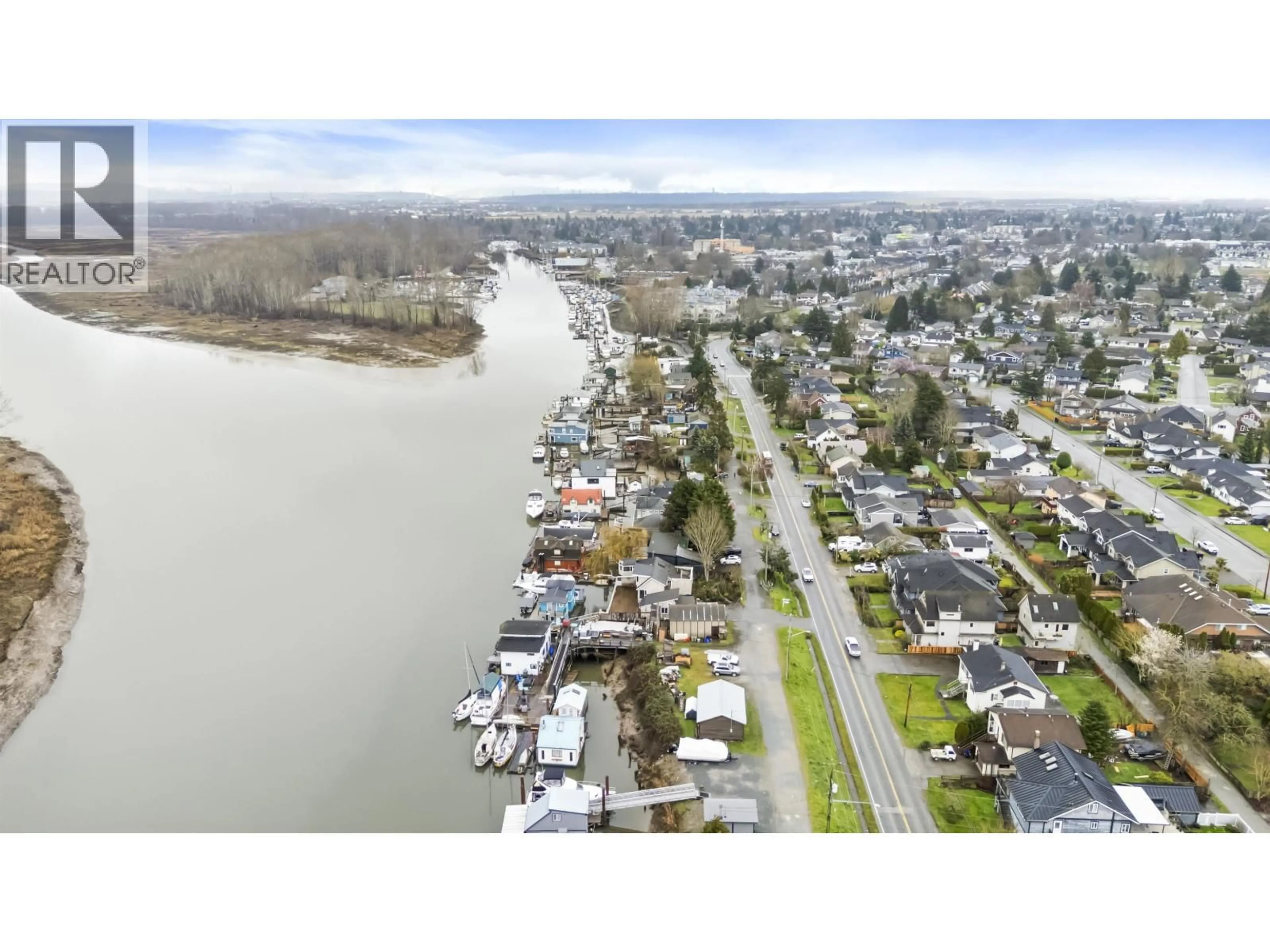 A pic from outside/outdoor area/front of a property/back of a property/a pic from drone, water/lake/river/ocean view for 4505 RIVER ROAD, Delta British Columbia V4K1R9