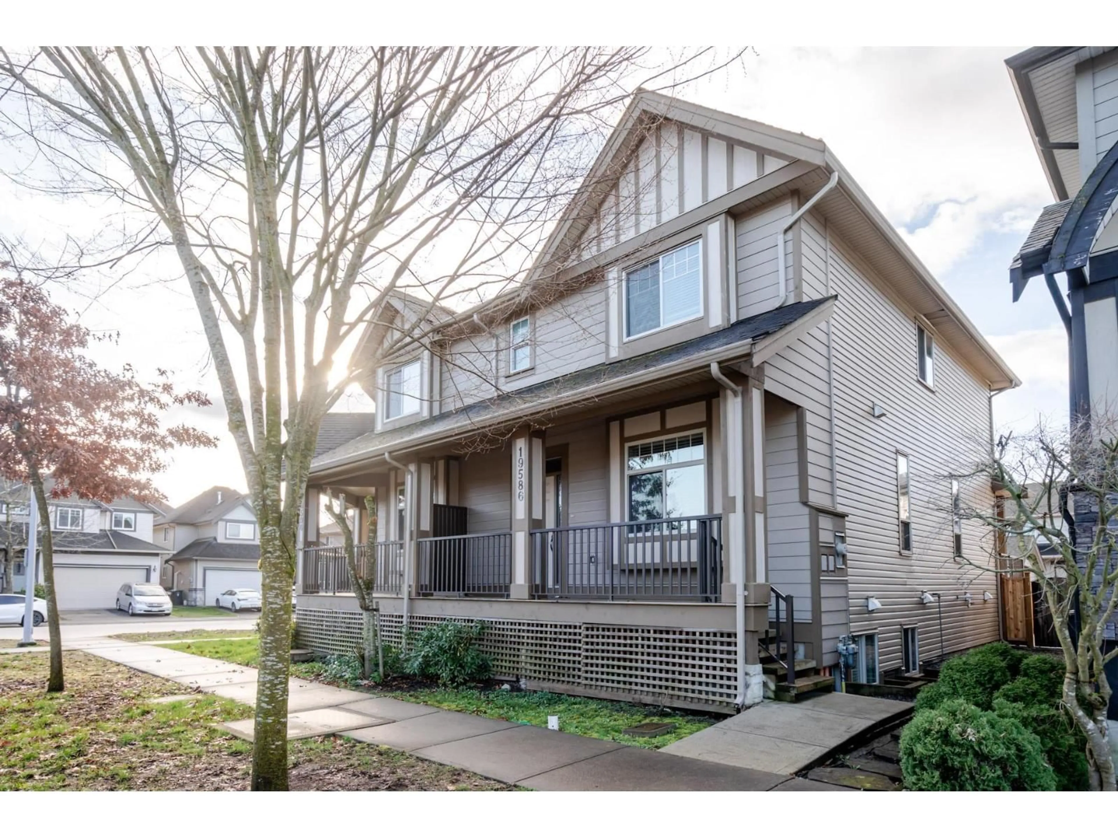 Home with vinyl exterior material, street for 19586 72A AVENUE, Surrey British Columbia V4N3E8