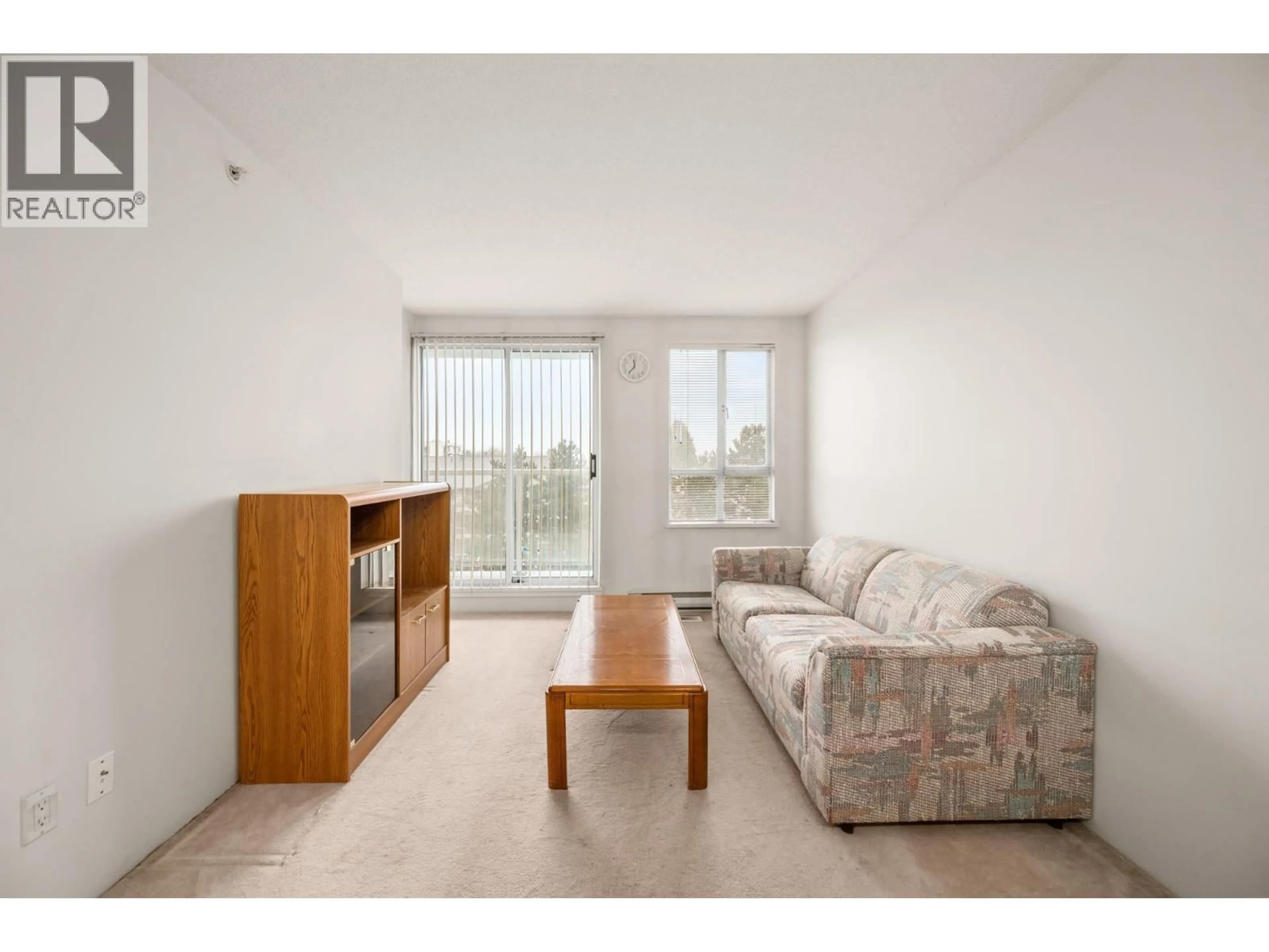 Living room with furniture, unknown for 607 - 3489 ASCOT PLACE, Vancouver British Columbia V5R6B6