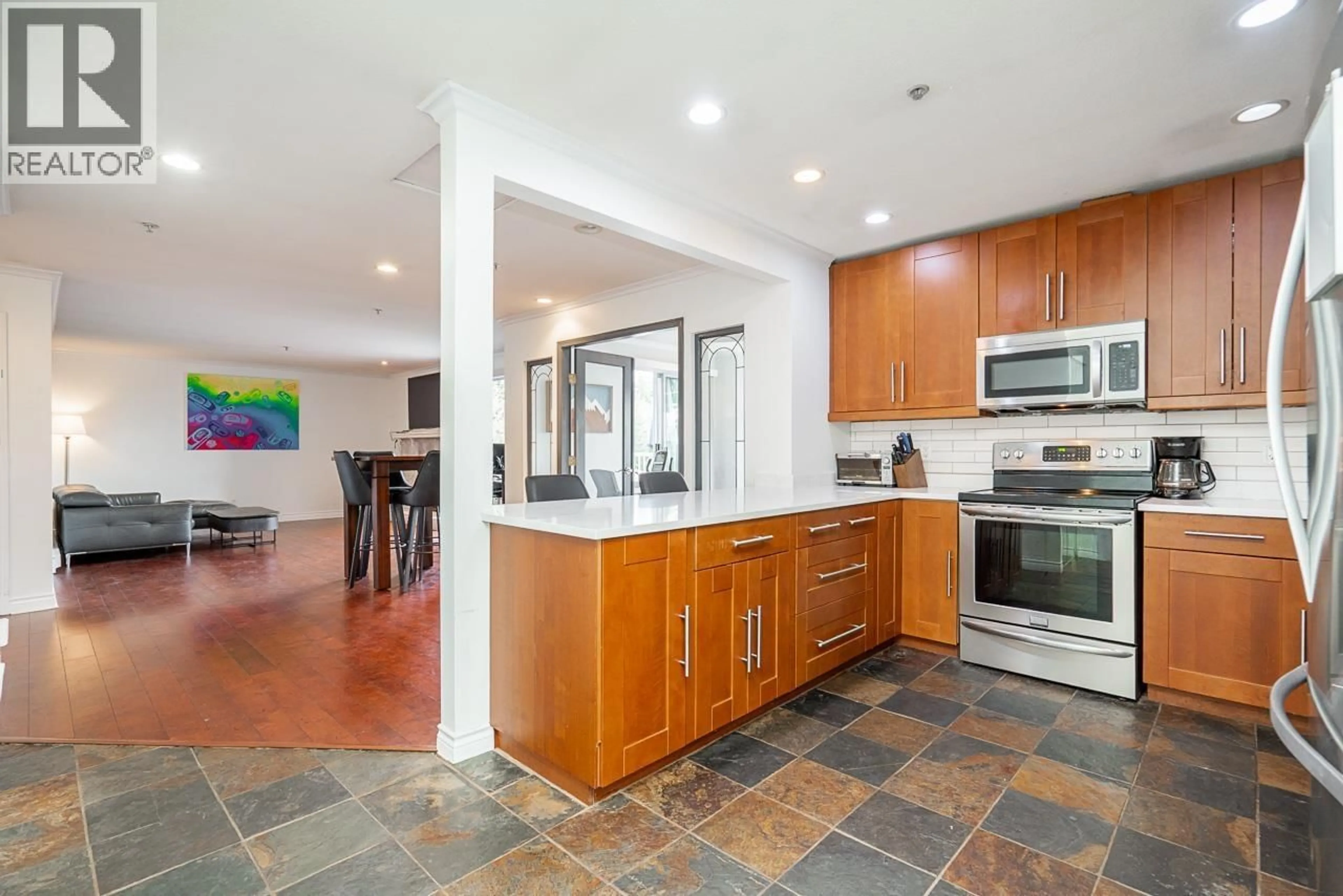 Open concept kitchen, ceramic/tile floor for 405 - 1000 BOWRON COURT, North Vancouver British Columbia V7H2W1