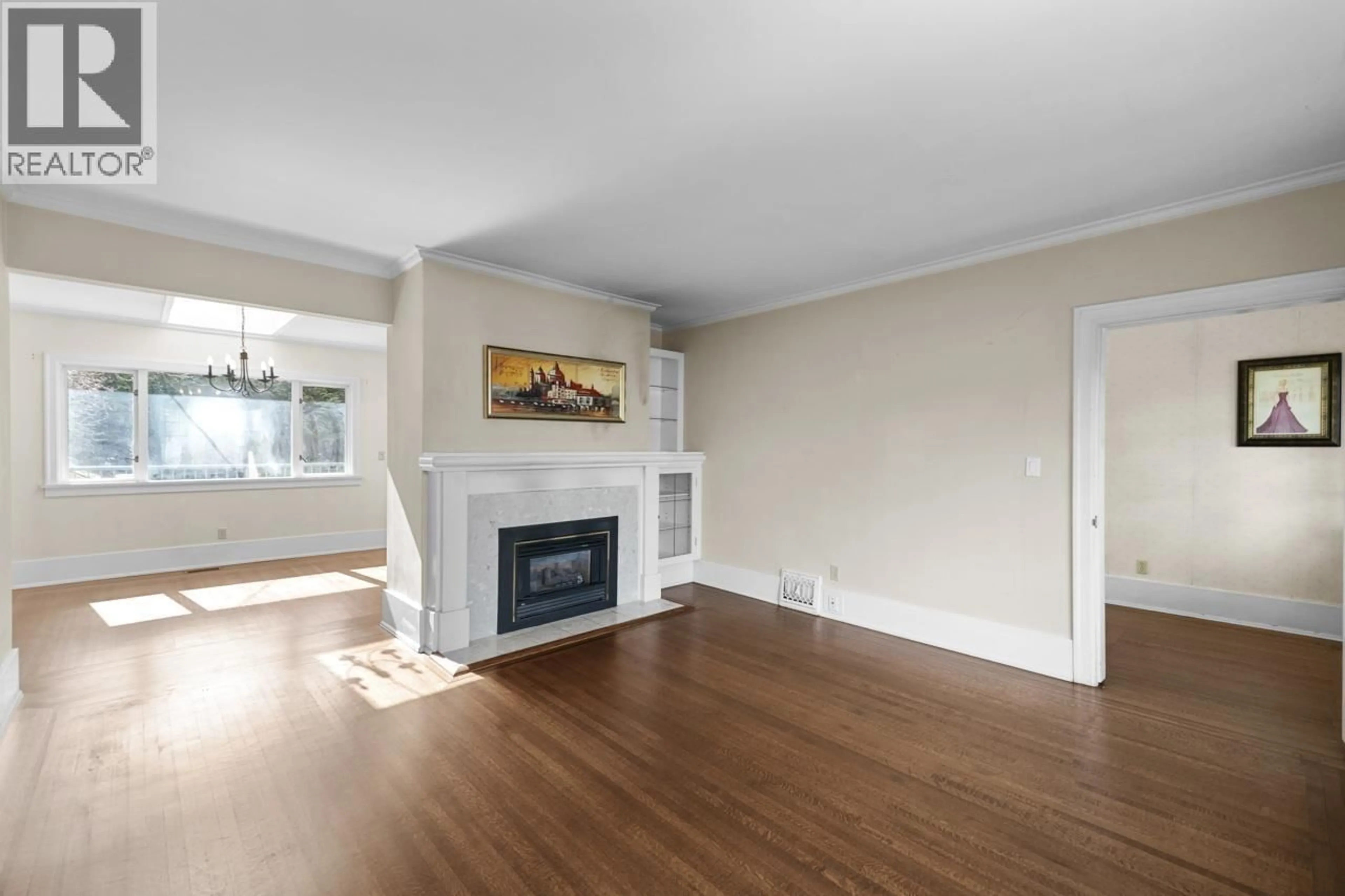 Living room with furniture, wood/laminate floor for 4278 12TH AVENUE, Vancouver British Columbia V6R2P7