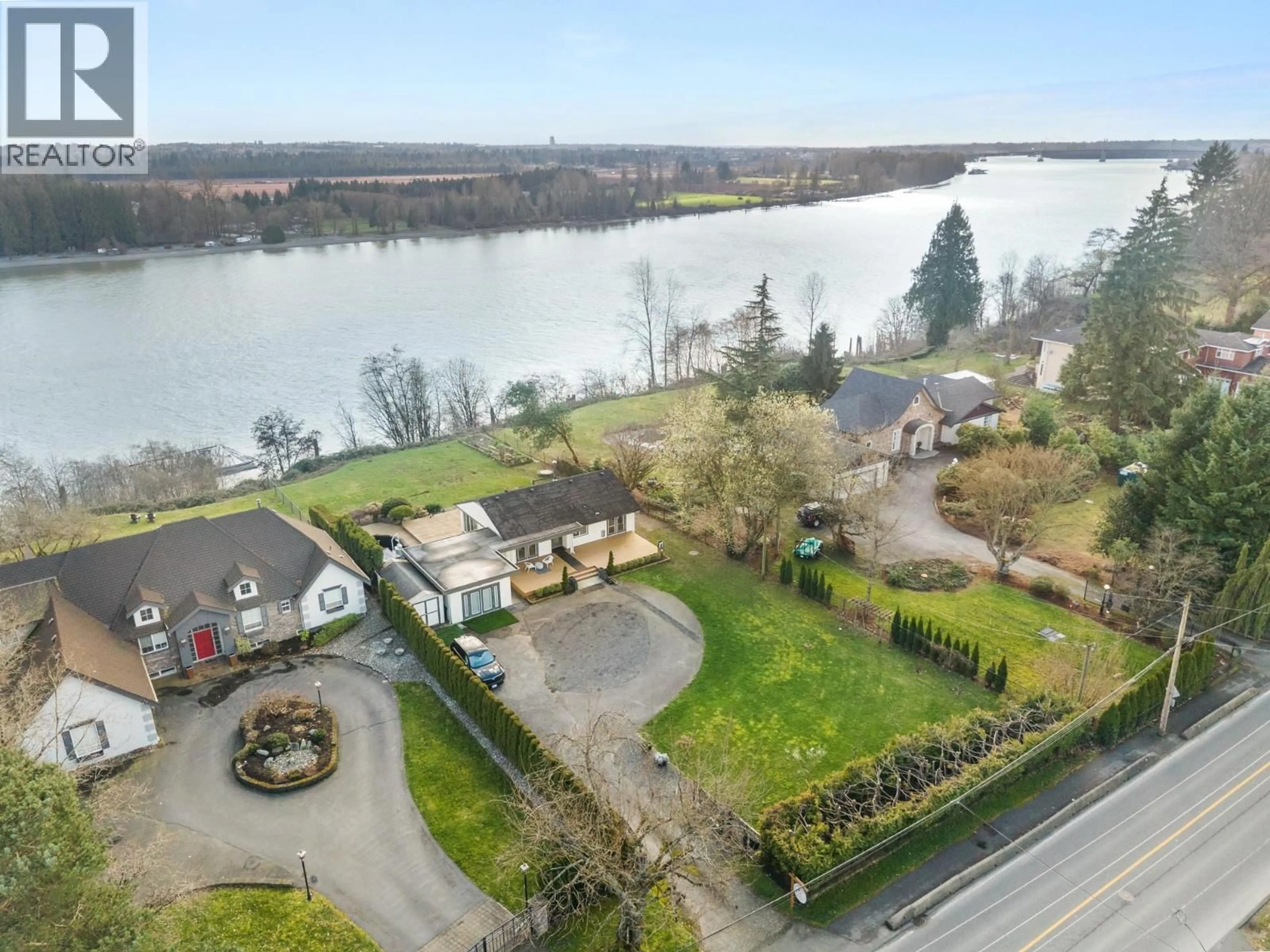 A pic from outside/outdoor area/front of a property/back of a property/a pic from drone, water/lake/river/ocean view for 21866 RIVER ROAD, Maple Ridge British Columbia V2X2C1