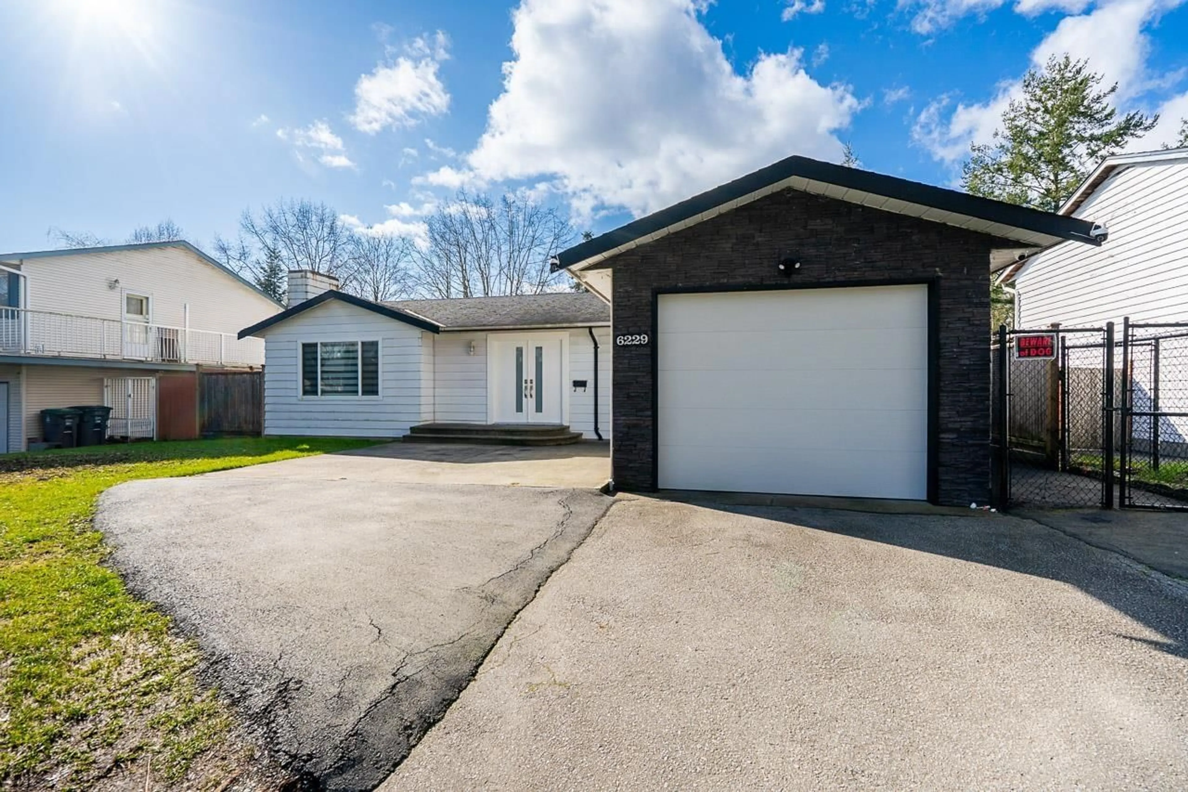 Home with vinyl exterior material, street for 6229 174B STREET, Surrey British Columbia V3S5K8