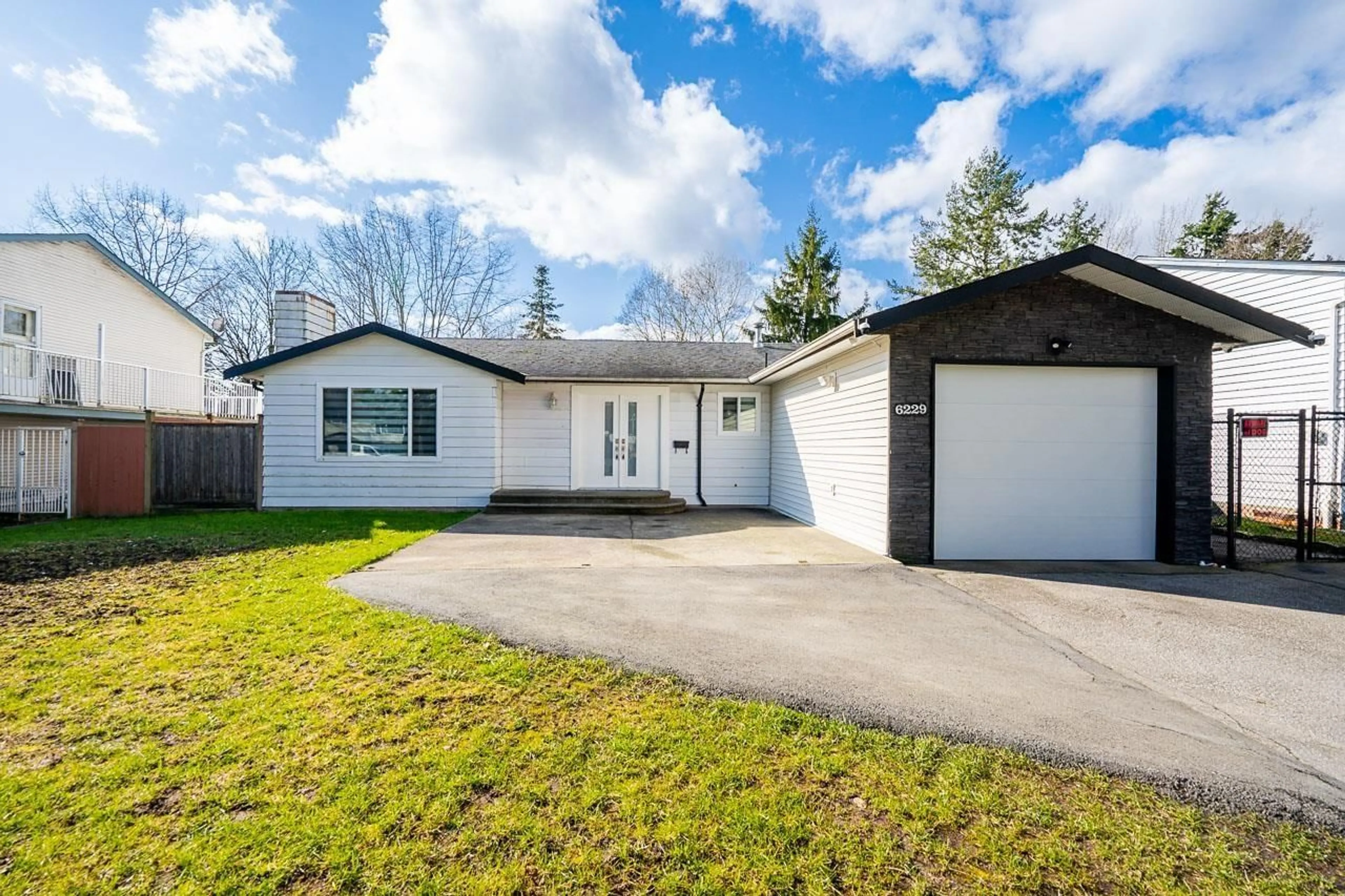 Home with vinyl exterior material, street for 6229 174B STREET, Surrey British Columbia V3S5K8