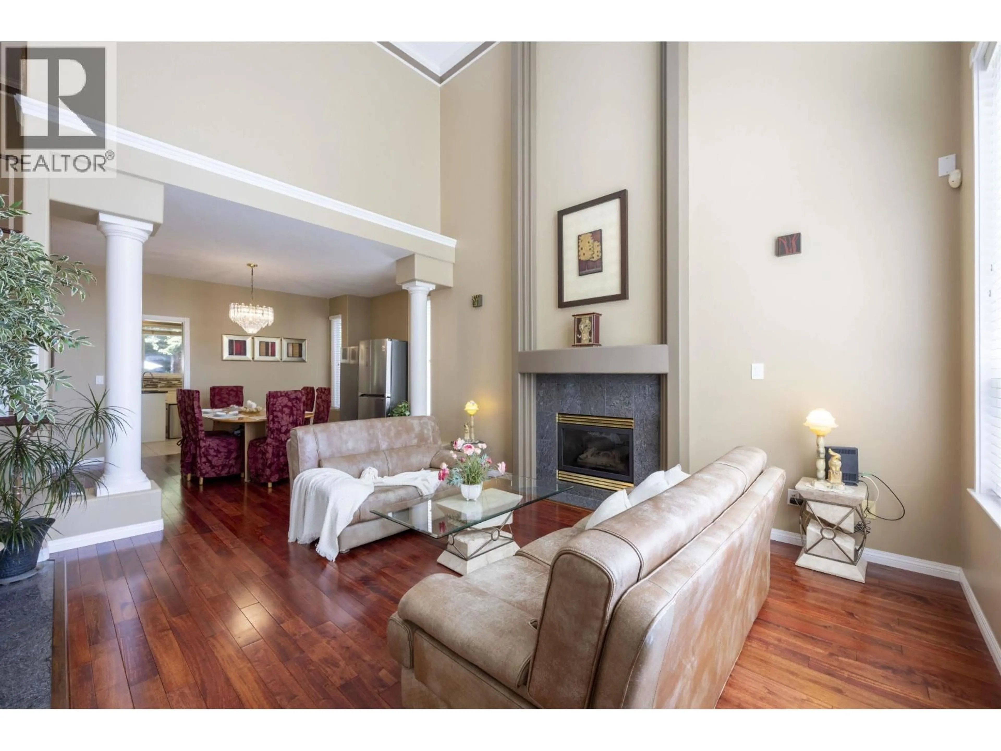 Living room with furniture, wood/laminate floor for 218 PARKSIDE DRIVE, Port Moody British Columbia V3H4Z6