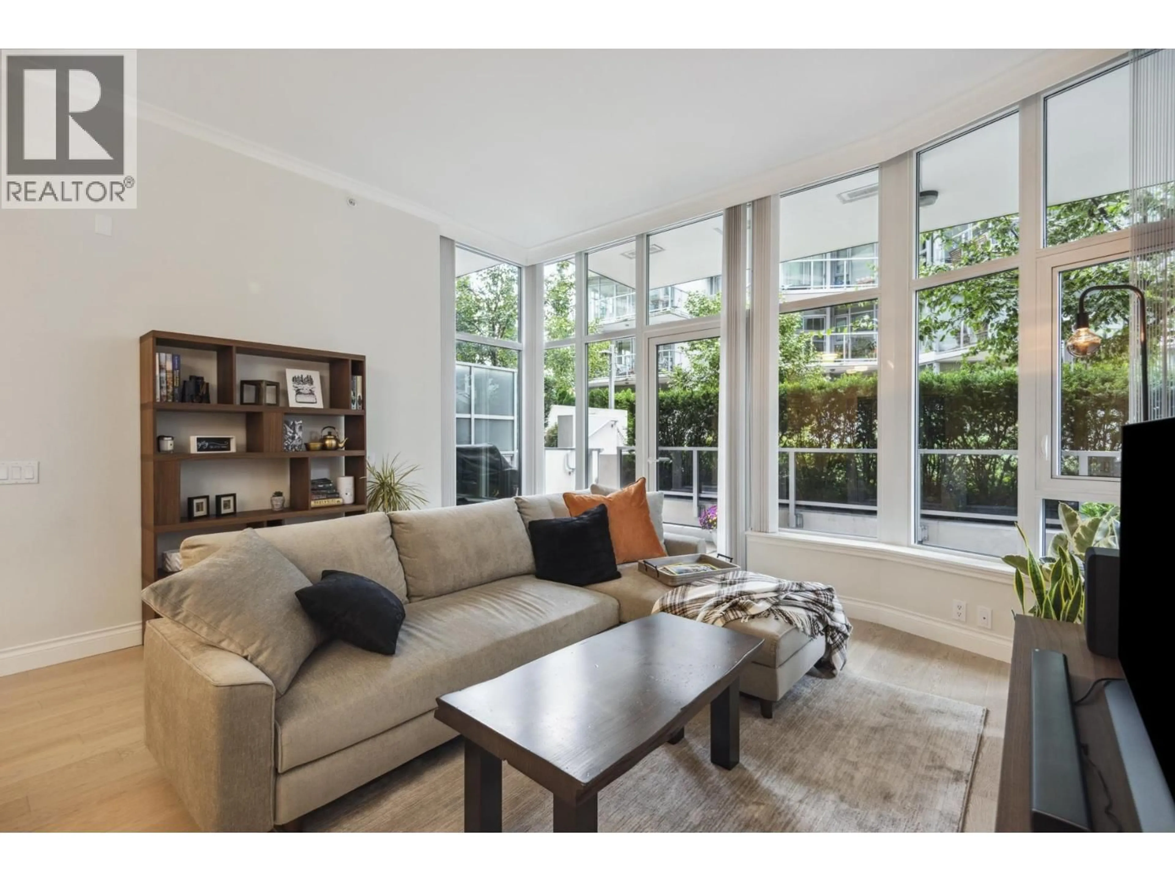 Living room with furniture, unknown for 112 - 185 VICTORY SHIP WAY, North Vancouver British Columbia V7L0G2