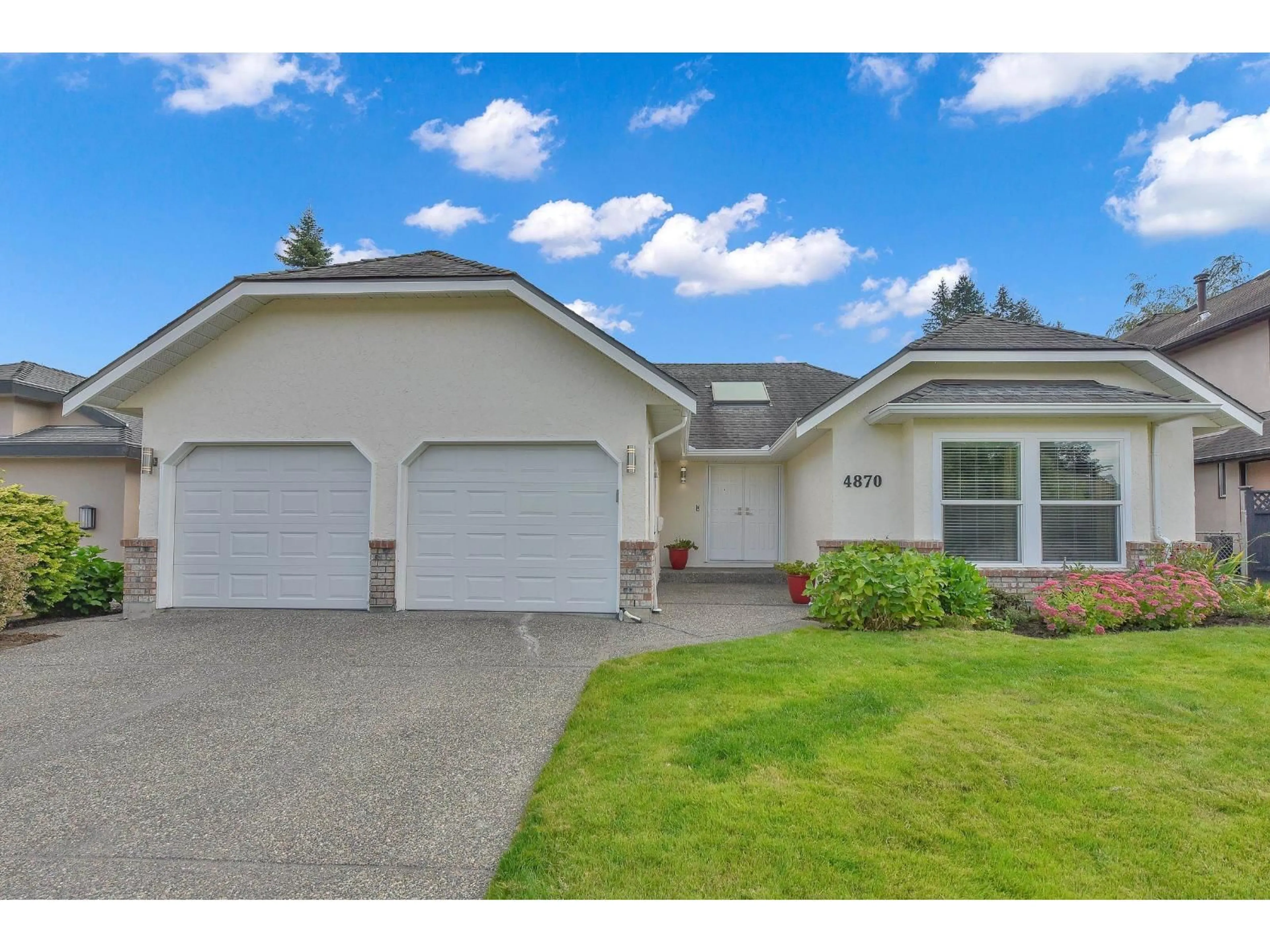 Home with vinyl exterior material, street for 4870 209A STREET, Langley British Columbia V3A8A1