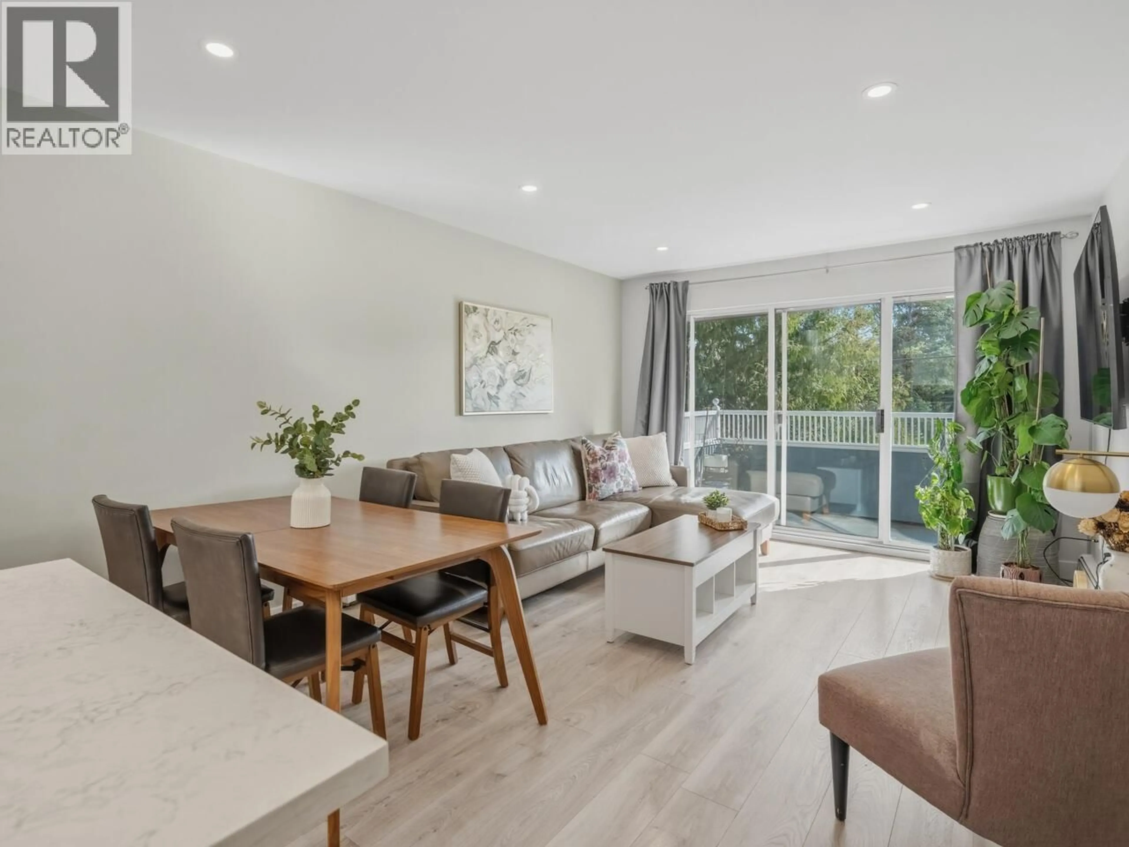 Living room with furniture, wood/laminate floor for 305 - 3875 4TH AVENUE, Vancouver British Columbia V6R4H8