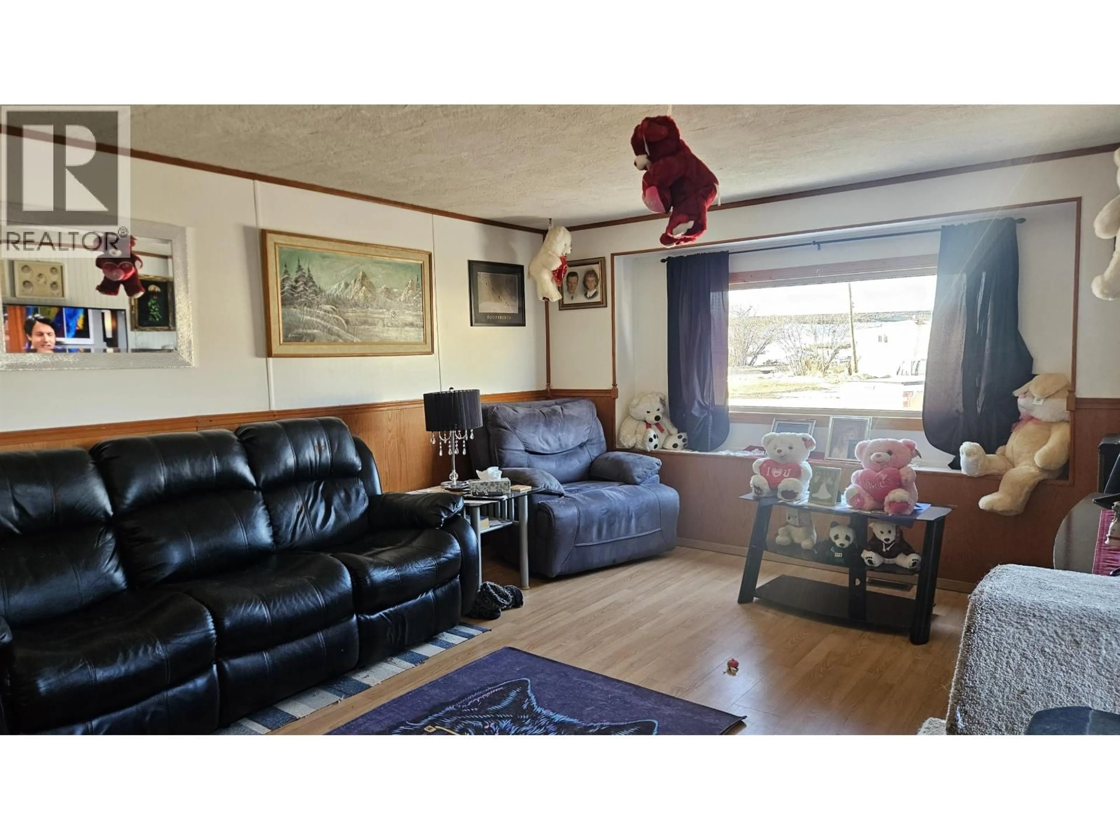 Living room with furniture, wood/laminate floor for 75 - 6828 ALCAN FRONTAGE ROAD, Fort St. John British Columbia V0C1C0