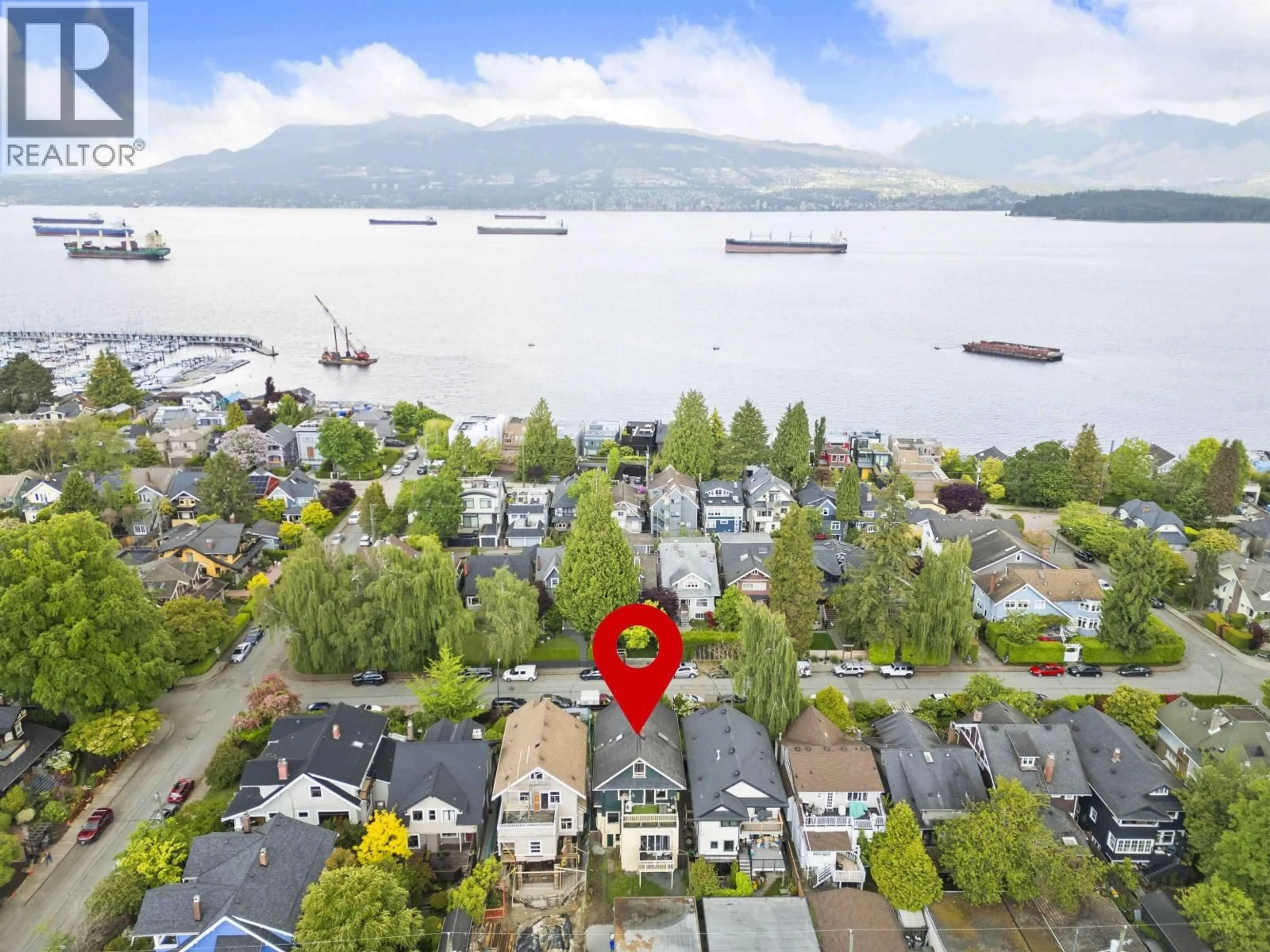 A pic from outside/outdoor area/front of a property/back of a property/a pic from drone, water/lake/river/ocean view for 3550 1ST AVENUE, Vancouver British Columbia V6R1G8