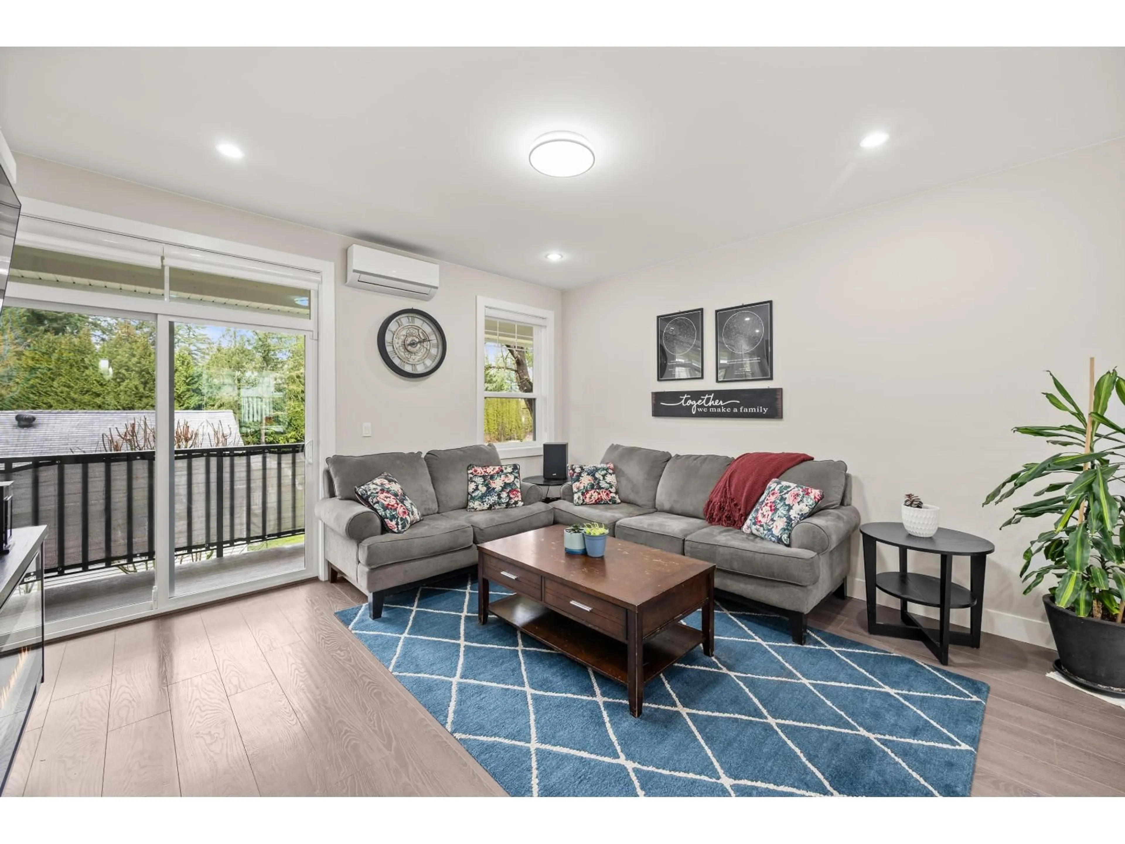 Living room with furniture, wood/laminate floor for 2 - 7410 194 STREET, Surrey British Columbia V4N6E1