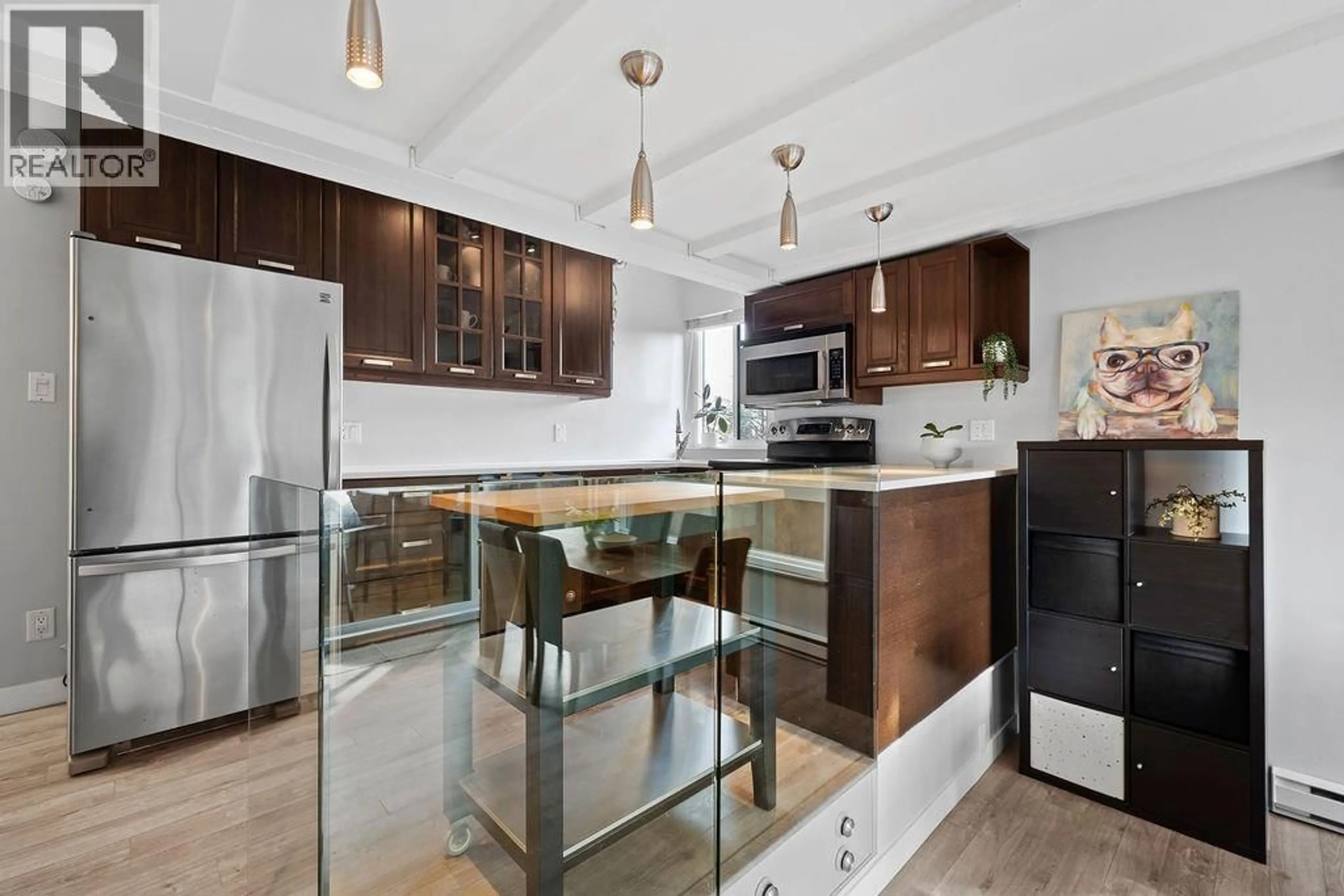 Open concept kitchen, unknown for 201 - 341 MAHON AVENUE, North Vancouver British Columbia V7M3E1