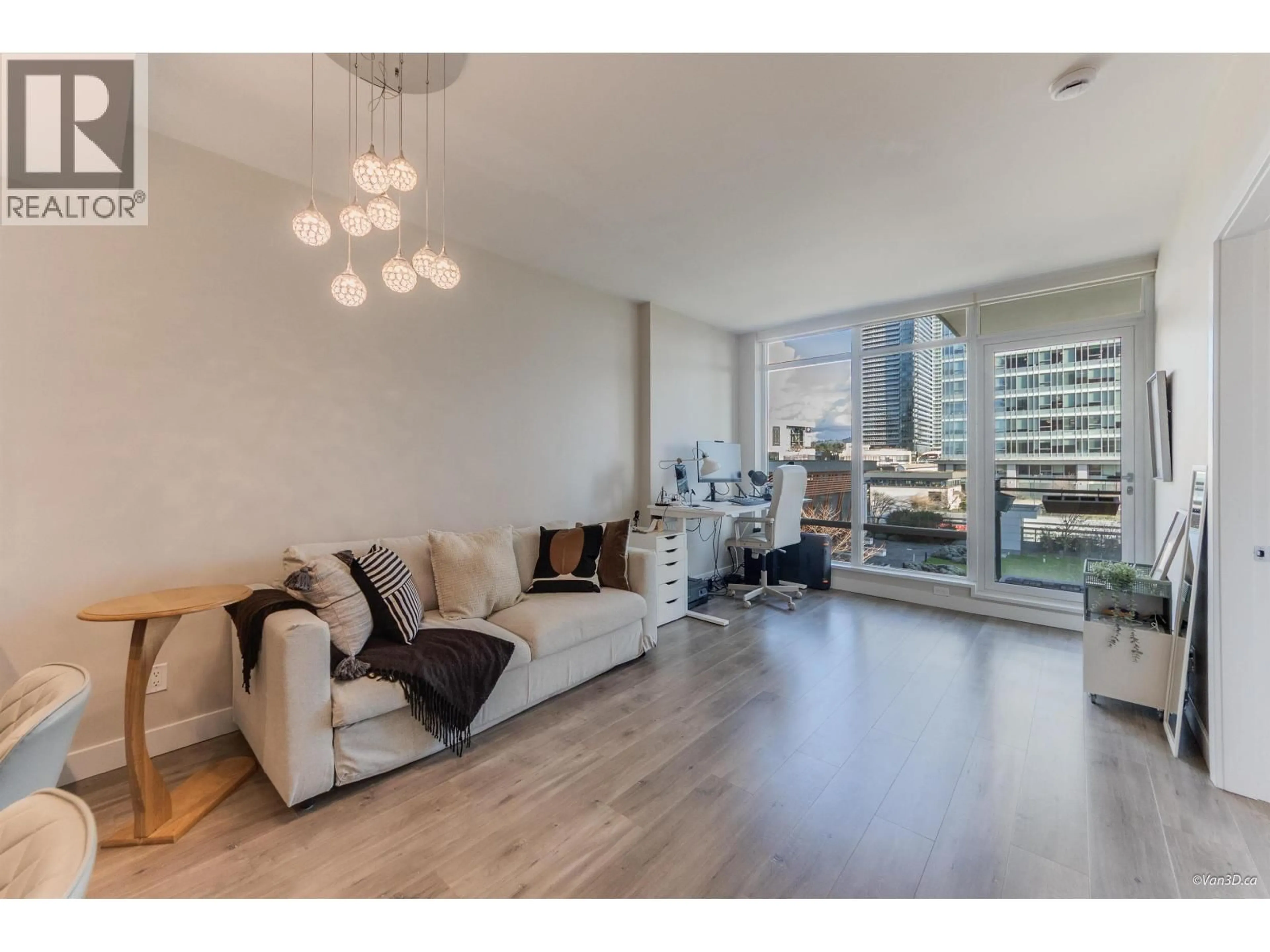 Living room with furniture, wood/laminate floor for 706 - 2008 ROSSER AVENUE, Burnaby British Columbia V5C0H8