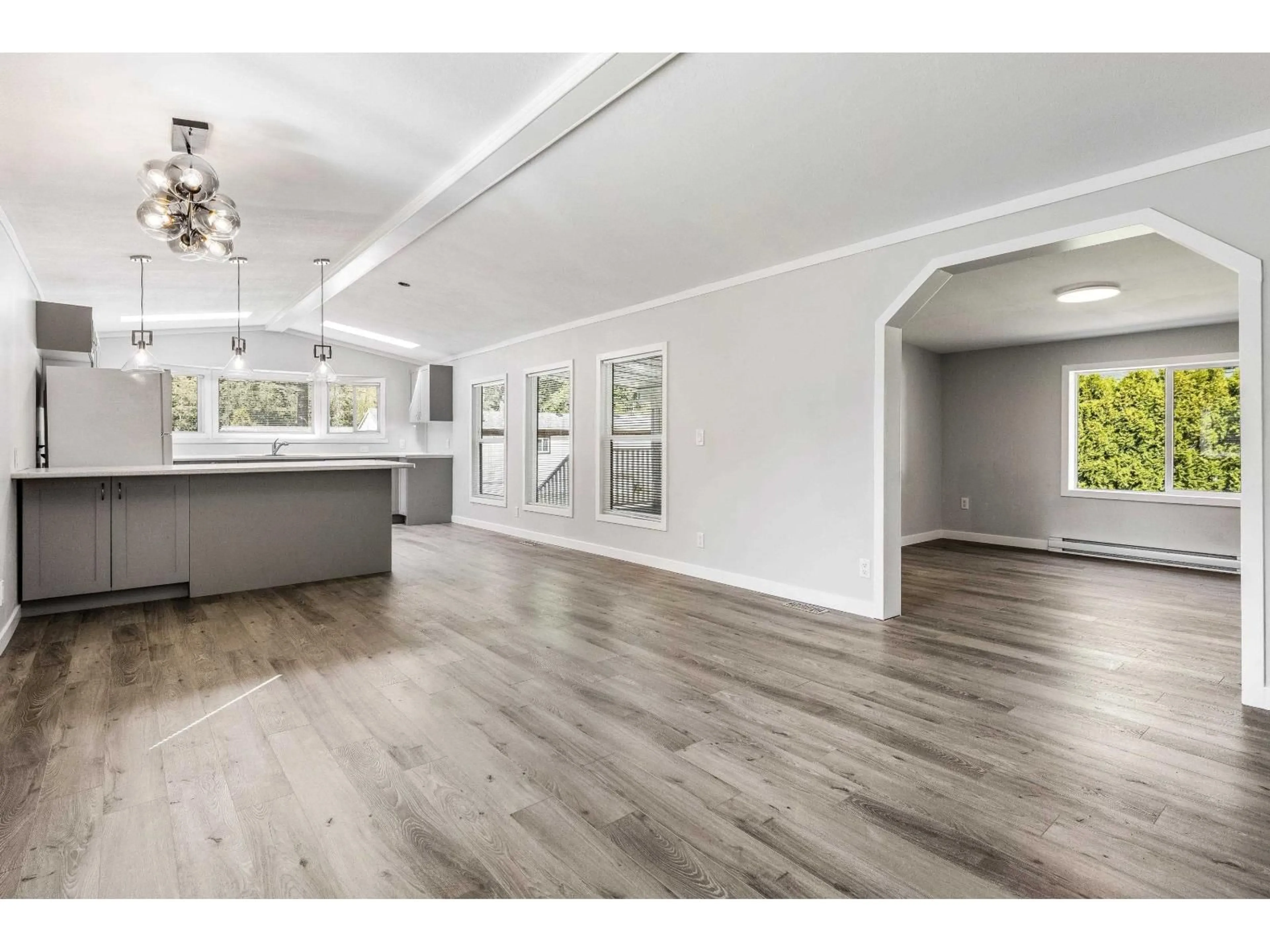 Open concept kitchen, wood/laminate floor for 30 - 65367 KAWKAWA LAKE ROAD, Hope British Columbia V0X1L1