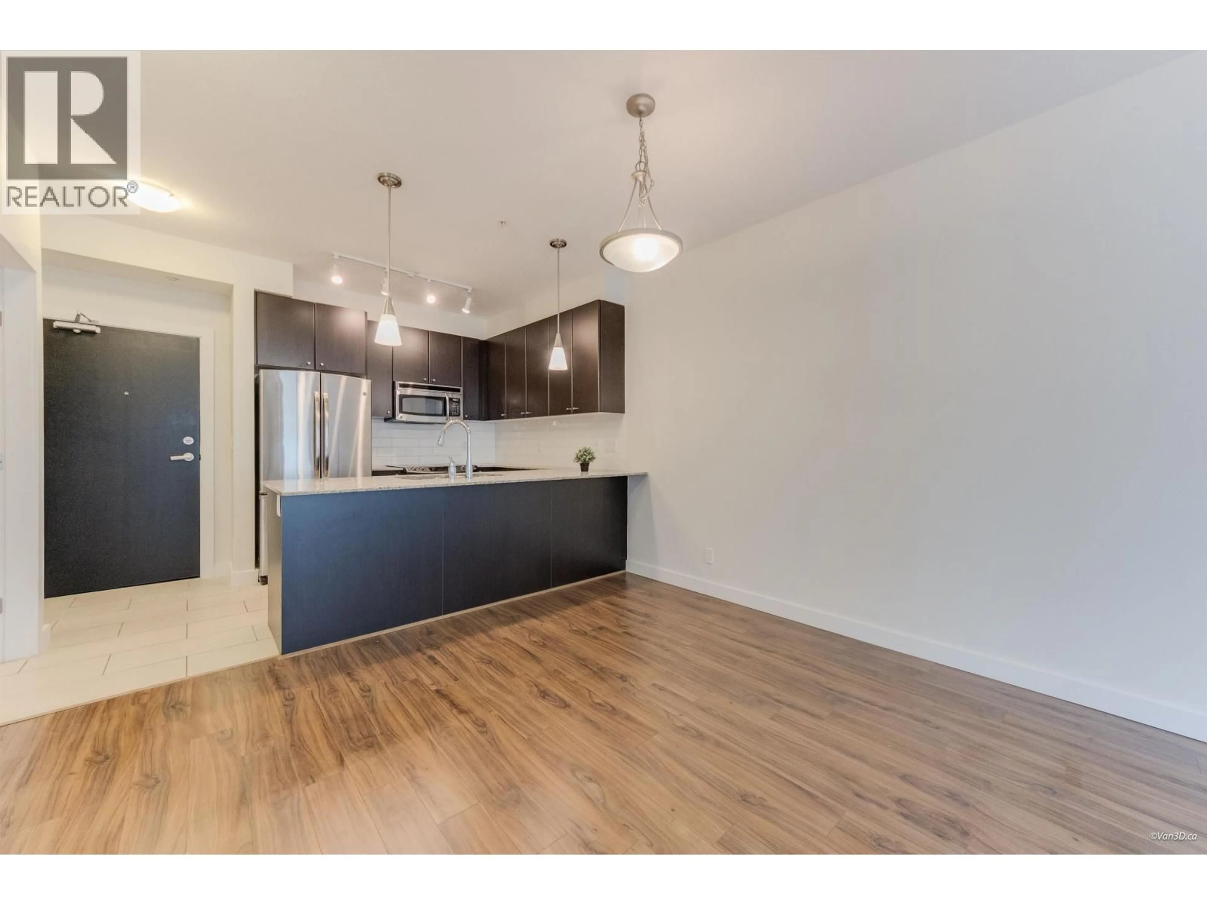 Open concept kitchen, wood/laminate floor for 207 - 240 FRANCIS WAY, New Westminster British Columbia V3L0E5