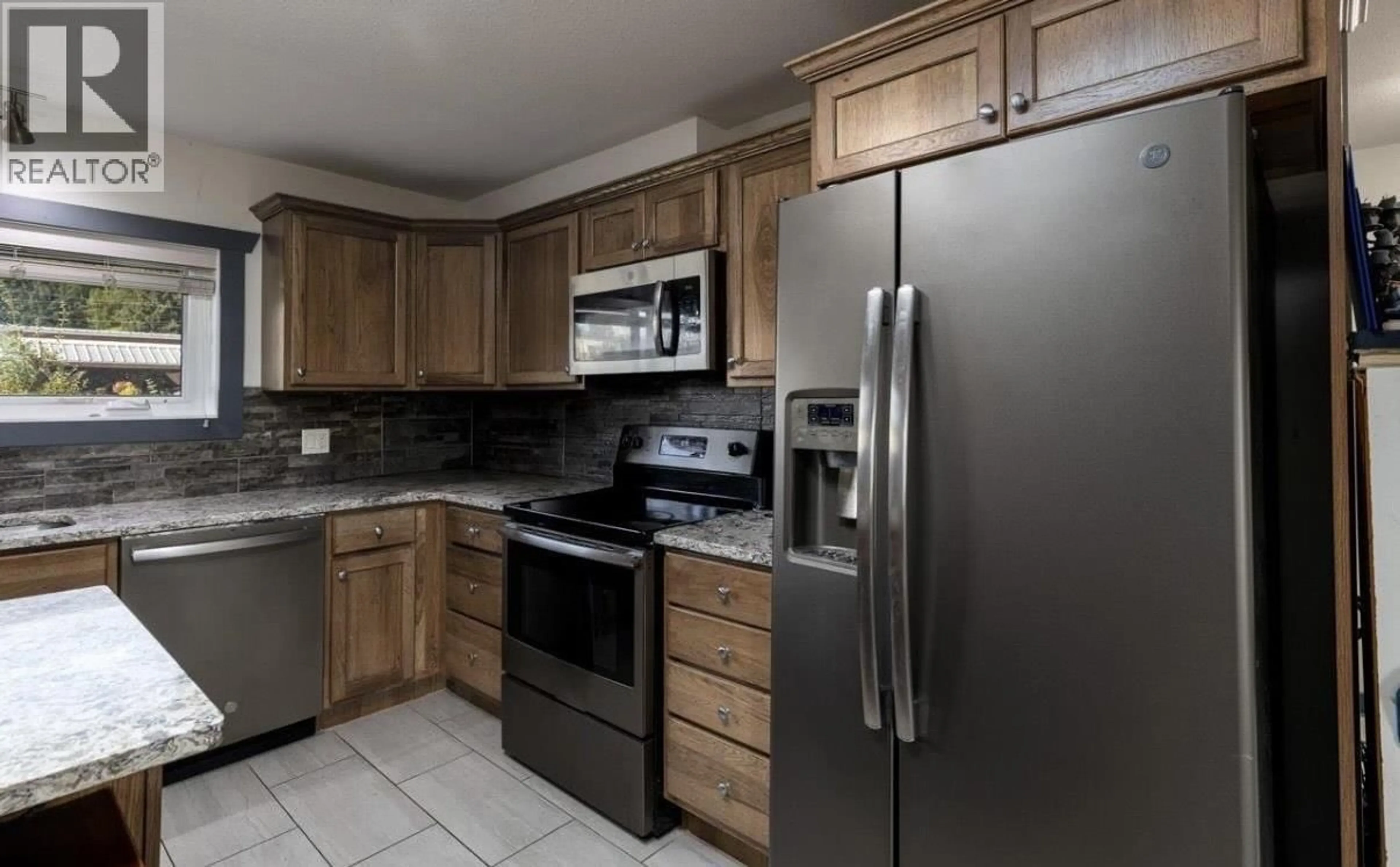 Standard kitchen, ceramic/tile floor for 4427 GREIG AVENUE, Terrace British Columbia V8G1M1