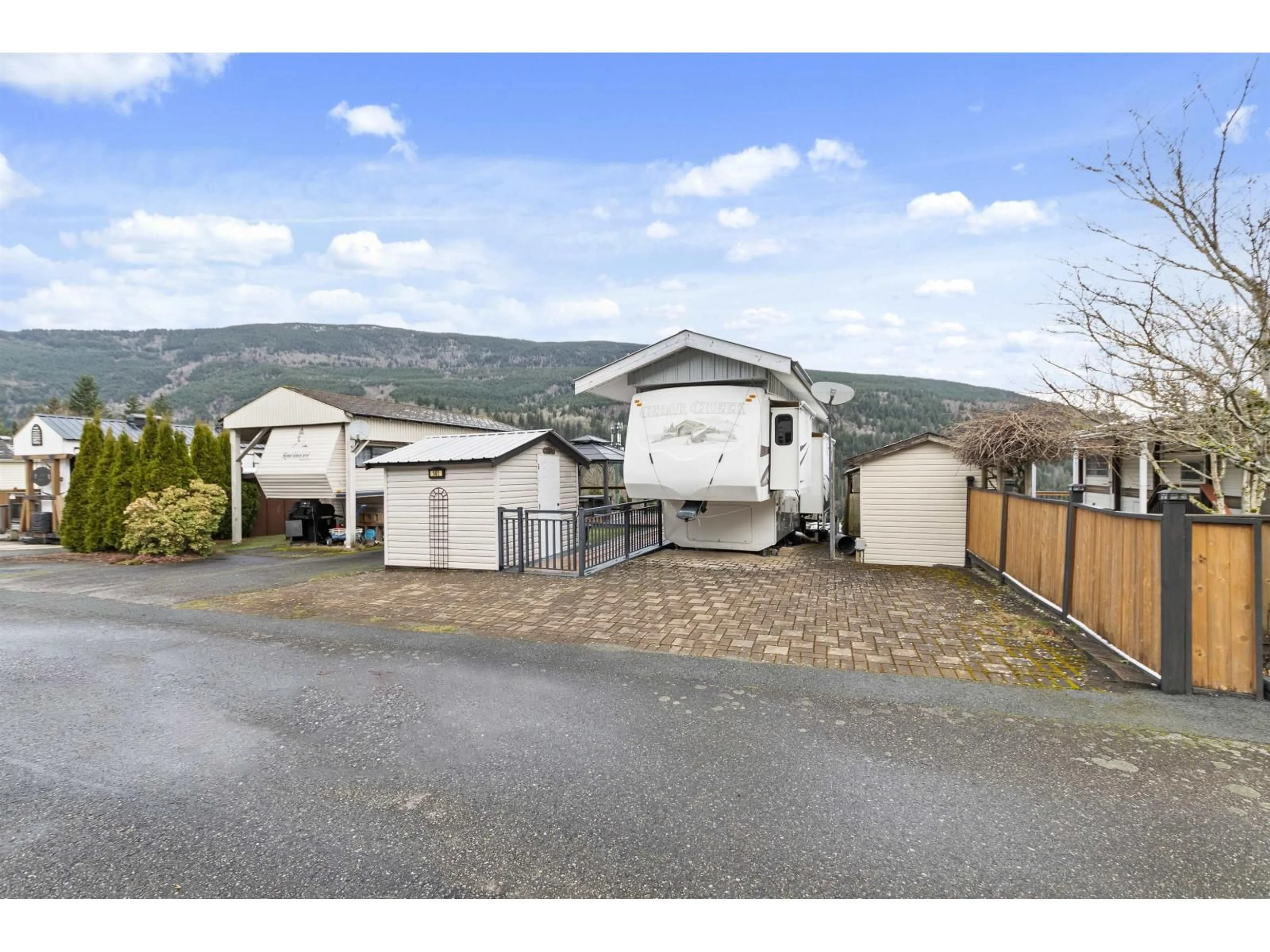 A pic from outside/outdoor area/front of a property/back of a property/a pic from drone, mountain view for 141 - 1436 FROST ROAD, Chilliwack British Columbia V2R4X8