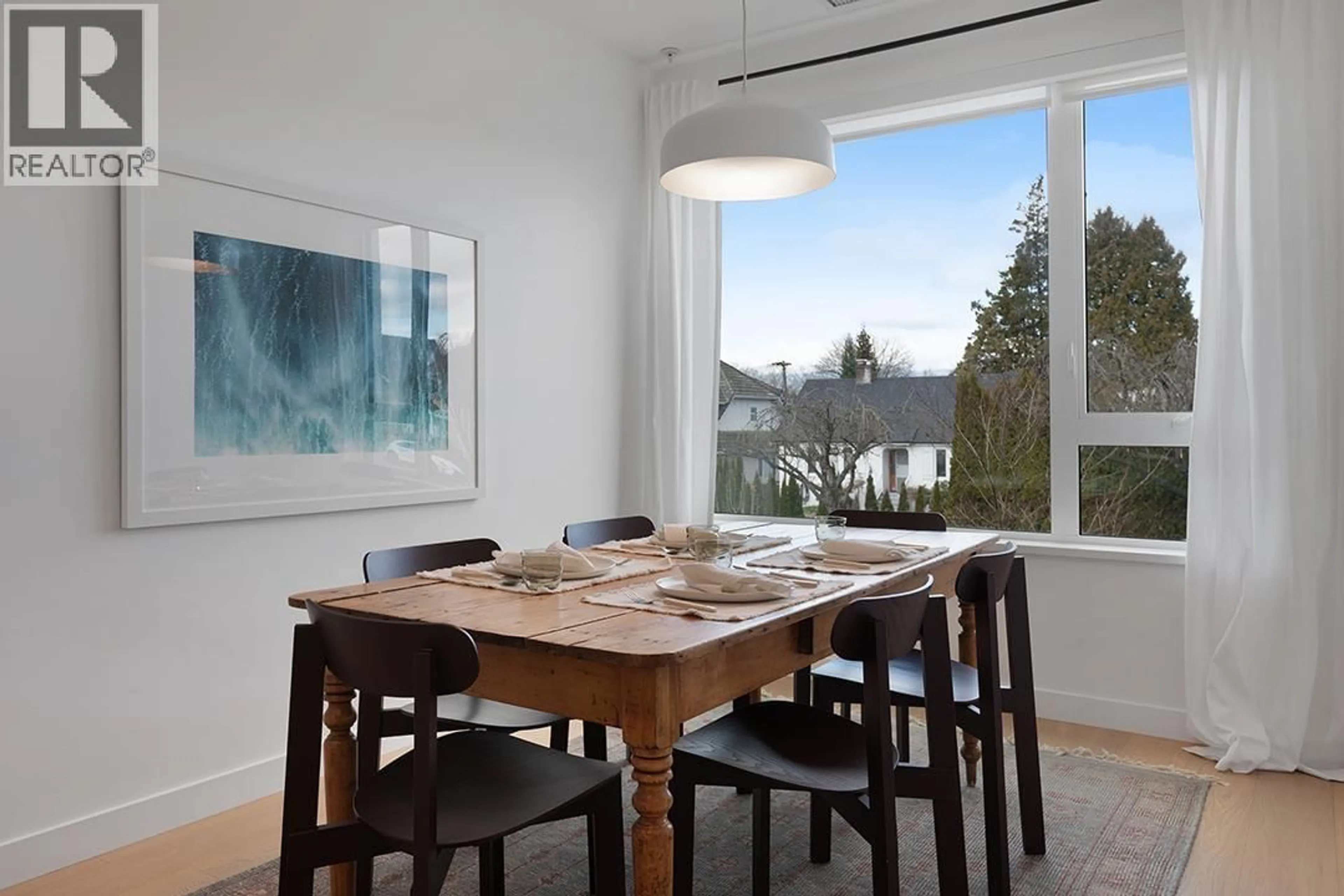Dining room, wood/laminate floor for 48 KING EDWARD AVENUE, Vancouver British Columbia V5Y0N6