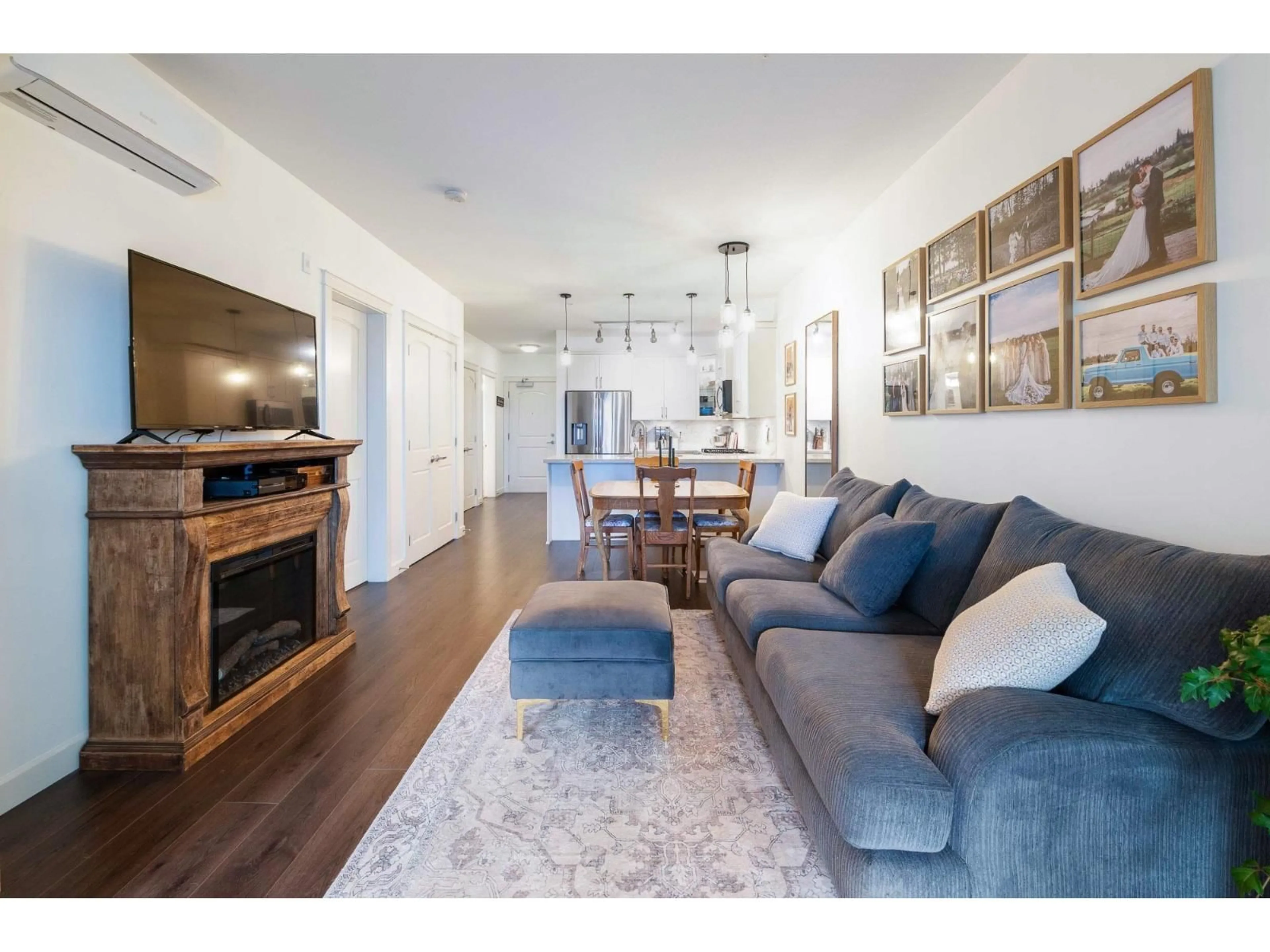 Living room with furniture, wood/laminate floor for 314 - 20376 86 AVENUE, Langley British Columbia V2Y3P8