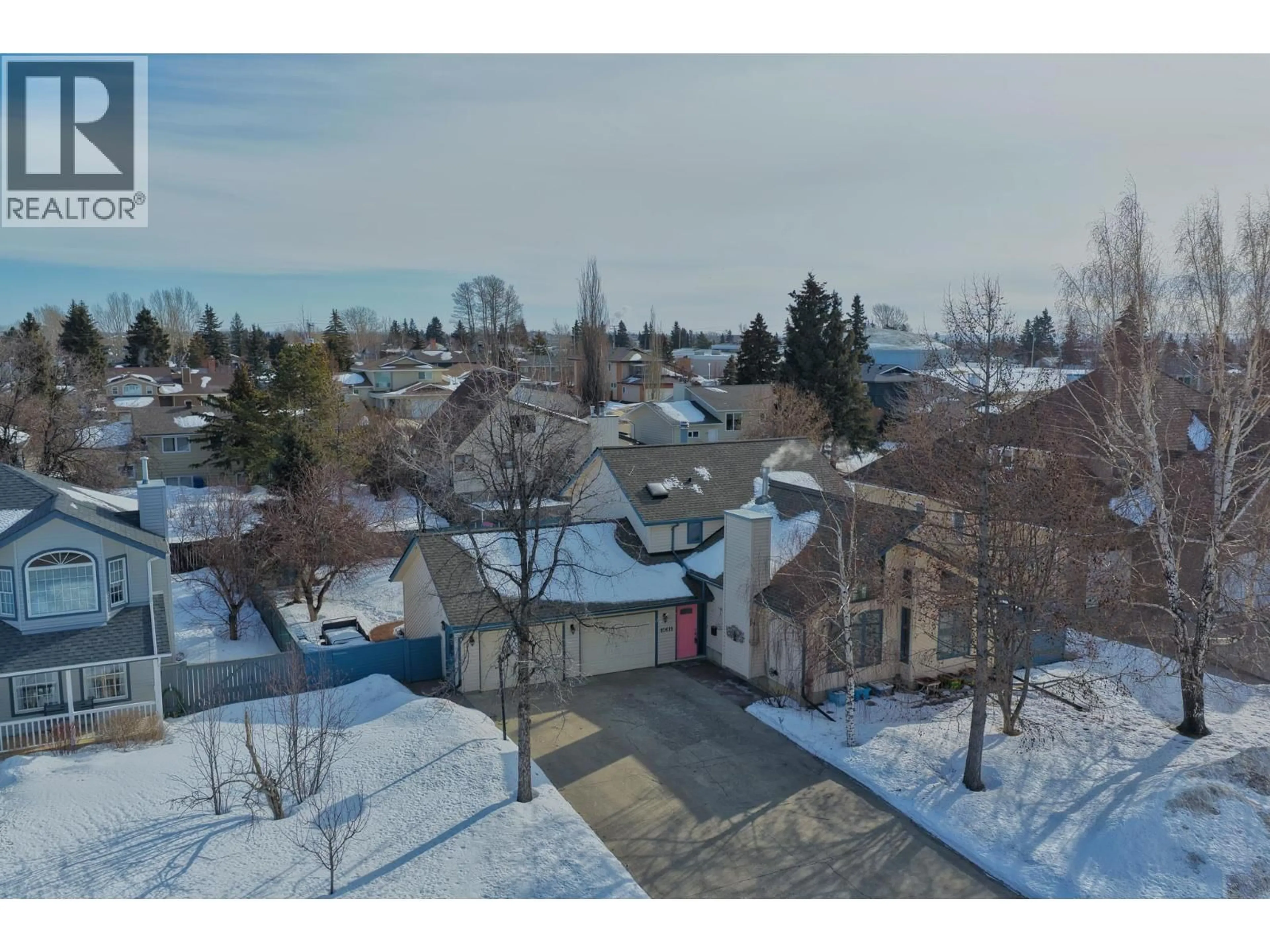 A pic from outside/outdoor area/front of a property/back of a property/a pic from drone, unknown for 10611 107 STREET, Fort St. John British Columbia V1J5N7