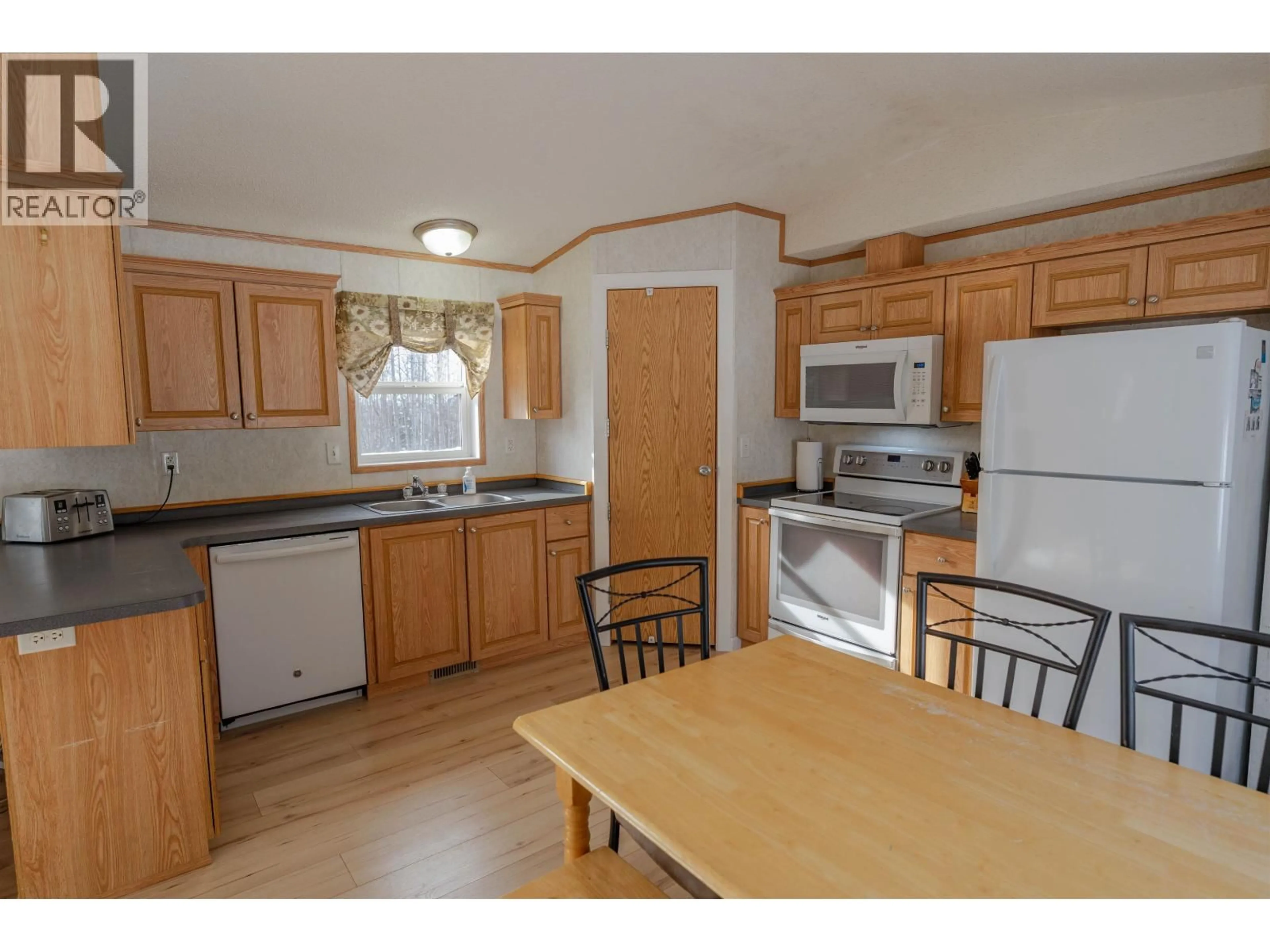 Standard kitchen, wood/laminate floor for 13619 283 ROAD, Fort St. John British Columbia V1J4M7