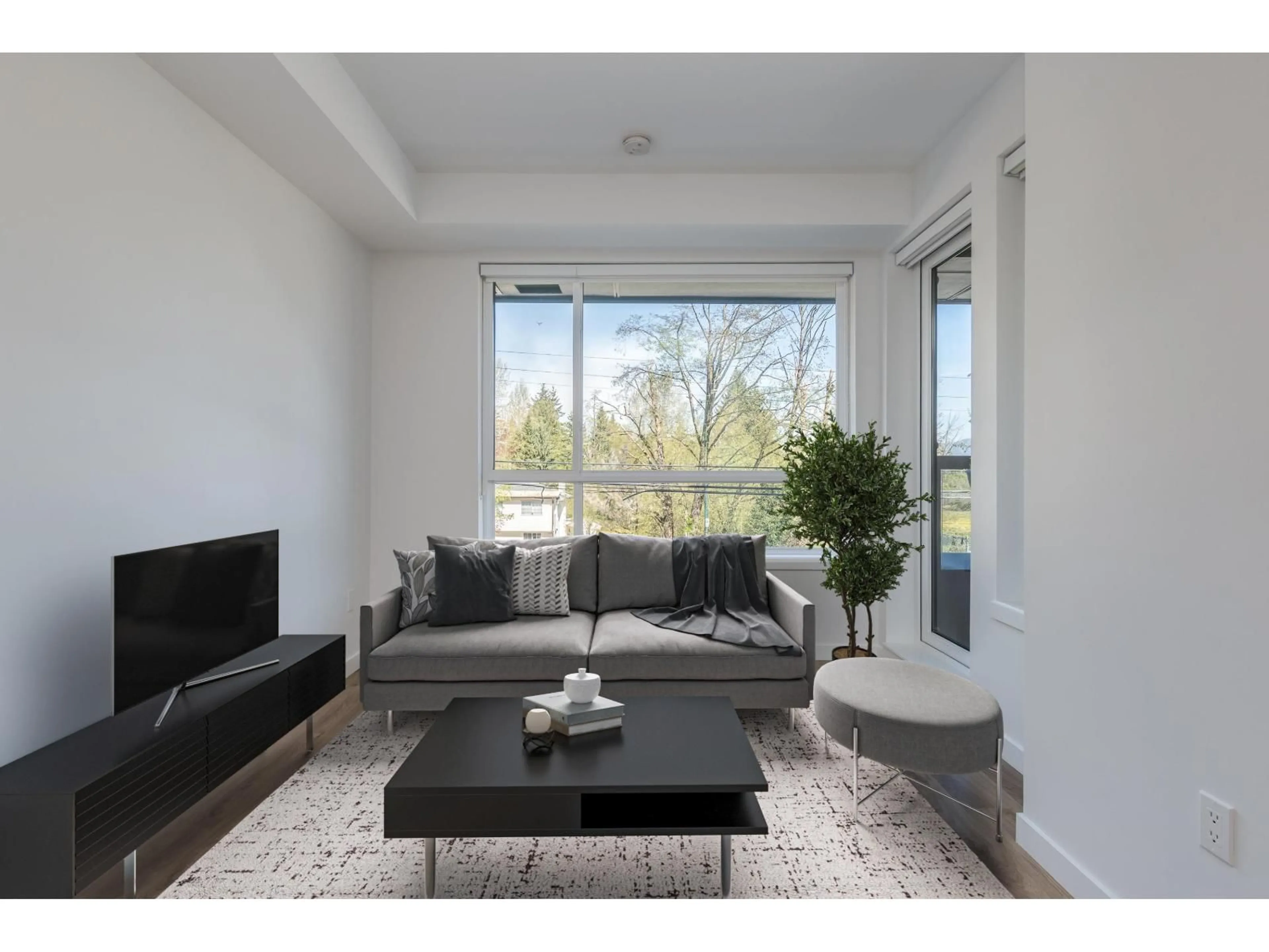 Living room with furniture, unknown for E216 - 13858 108 AVENUE, Surrey British Columbia V3T0T8