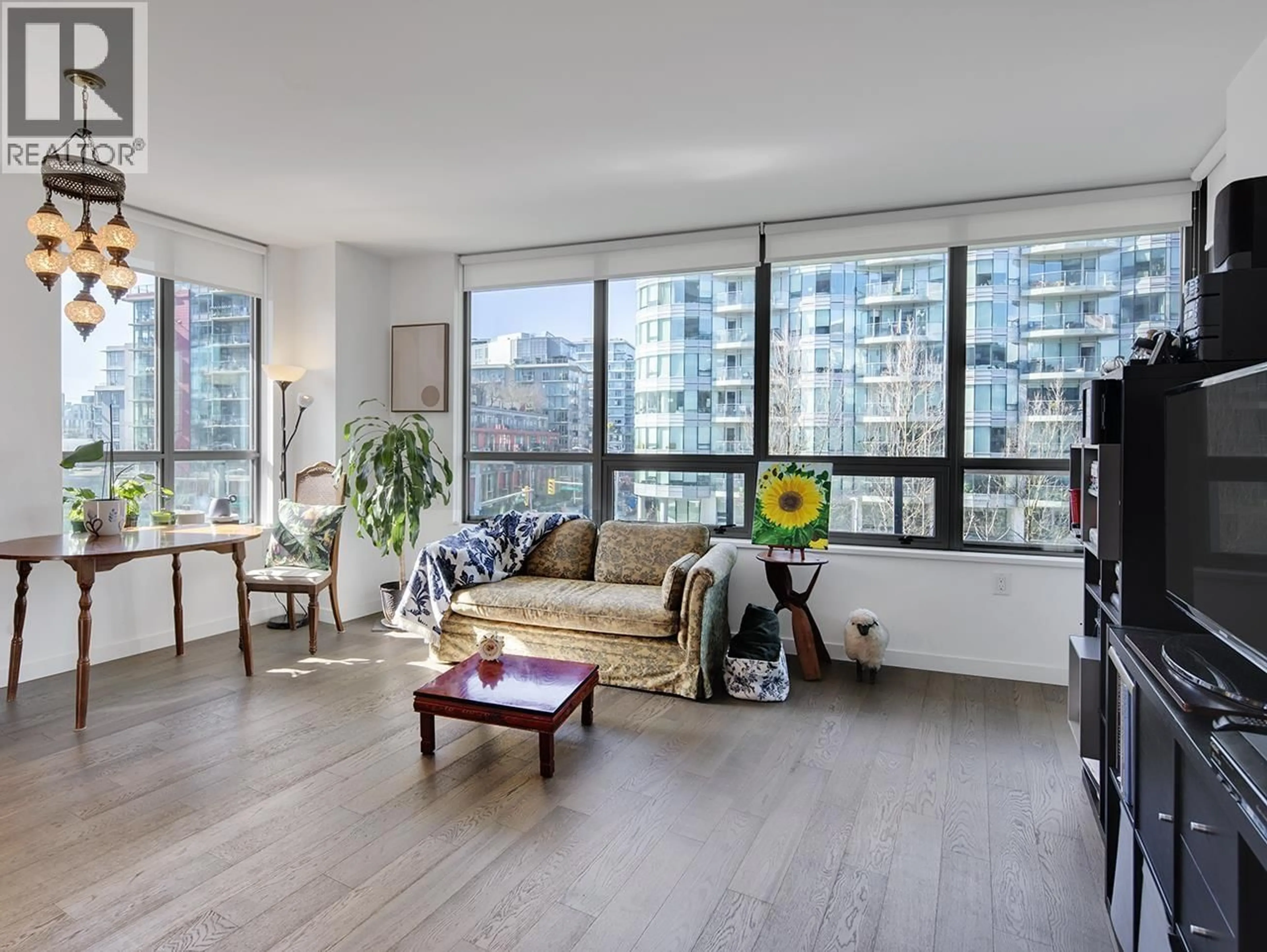 Living room with furniture, wood/laminate floor for 404 - 1688 PULLMAN PORTER STREET, Vancouver British Columbia V6A0H4