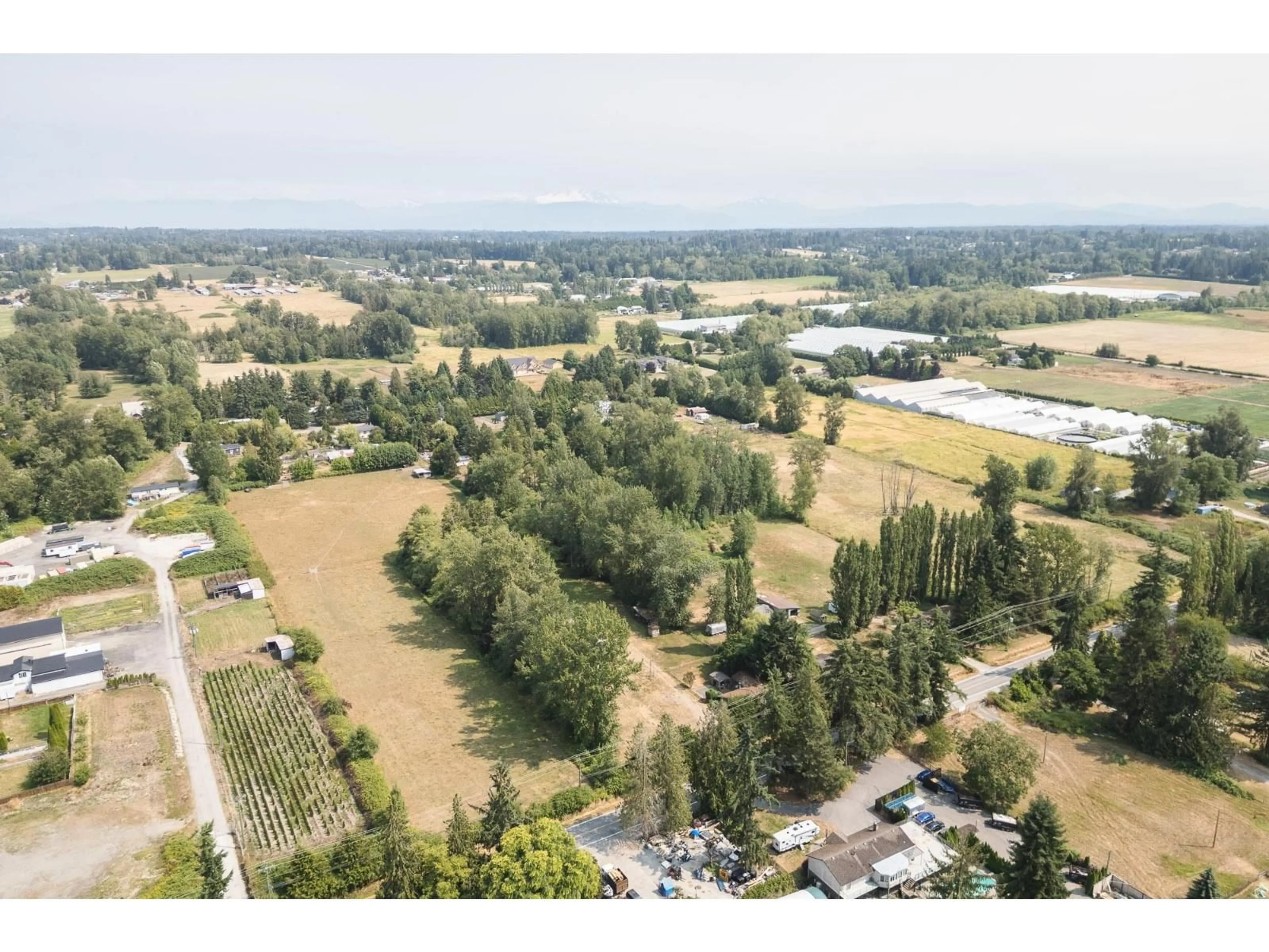 A pic from outside/outdoor area/front of a property/back of a property/a pic from drone, forest/trees view for 2708 208 STREET, Langley British Columbia V2Z2B1