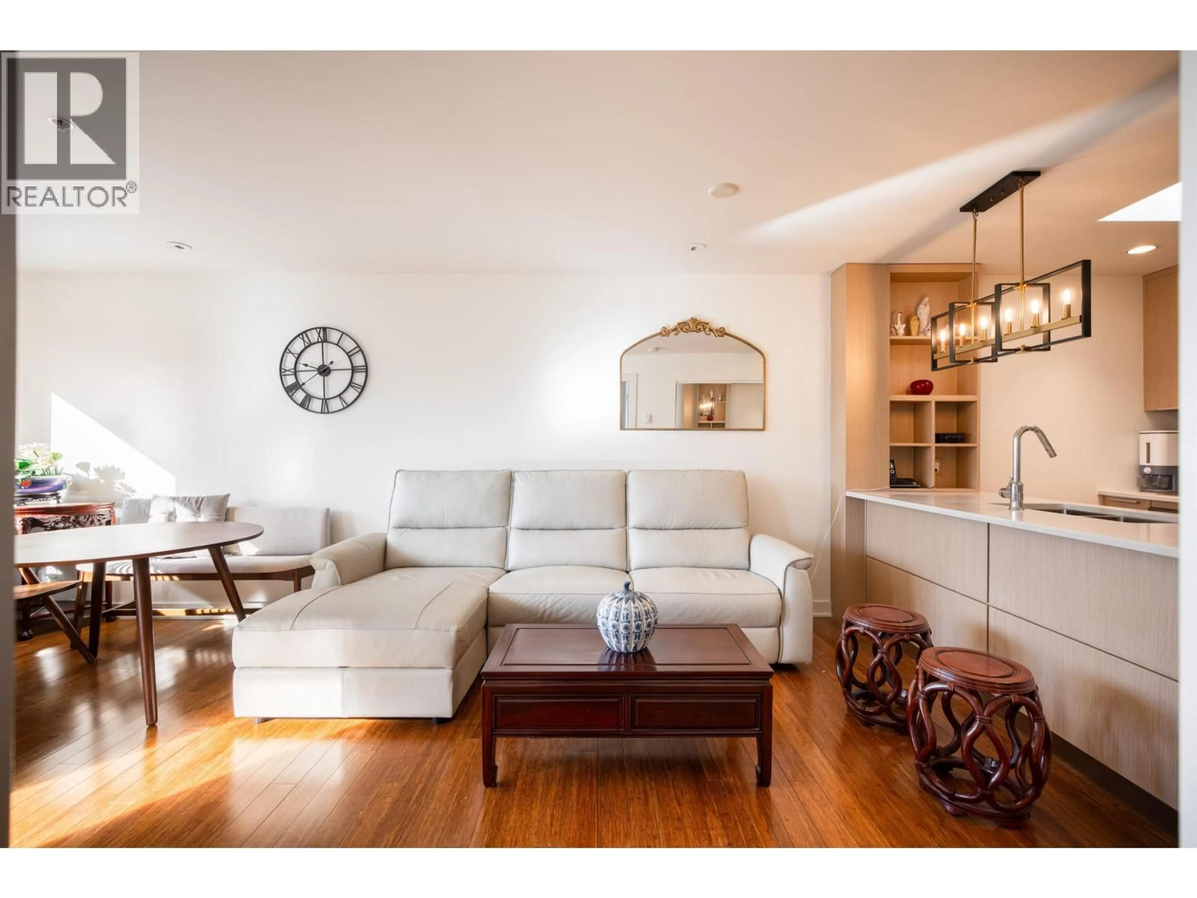 Living room with furniture, wood/laminate floor for 403 - 2481 WATERLOO STREET, Vancouver British Columbia V6R3H4