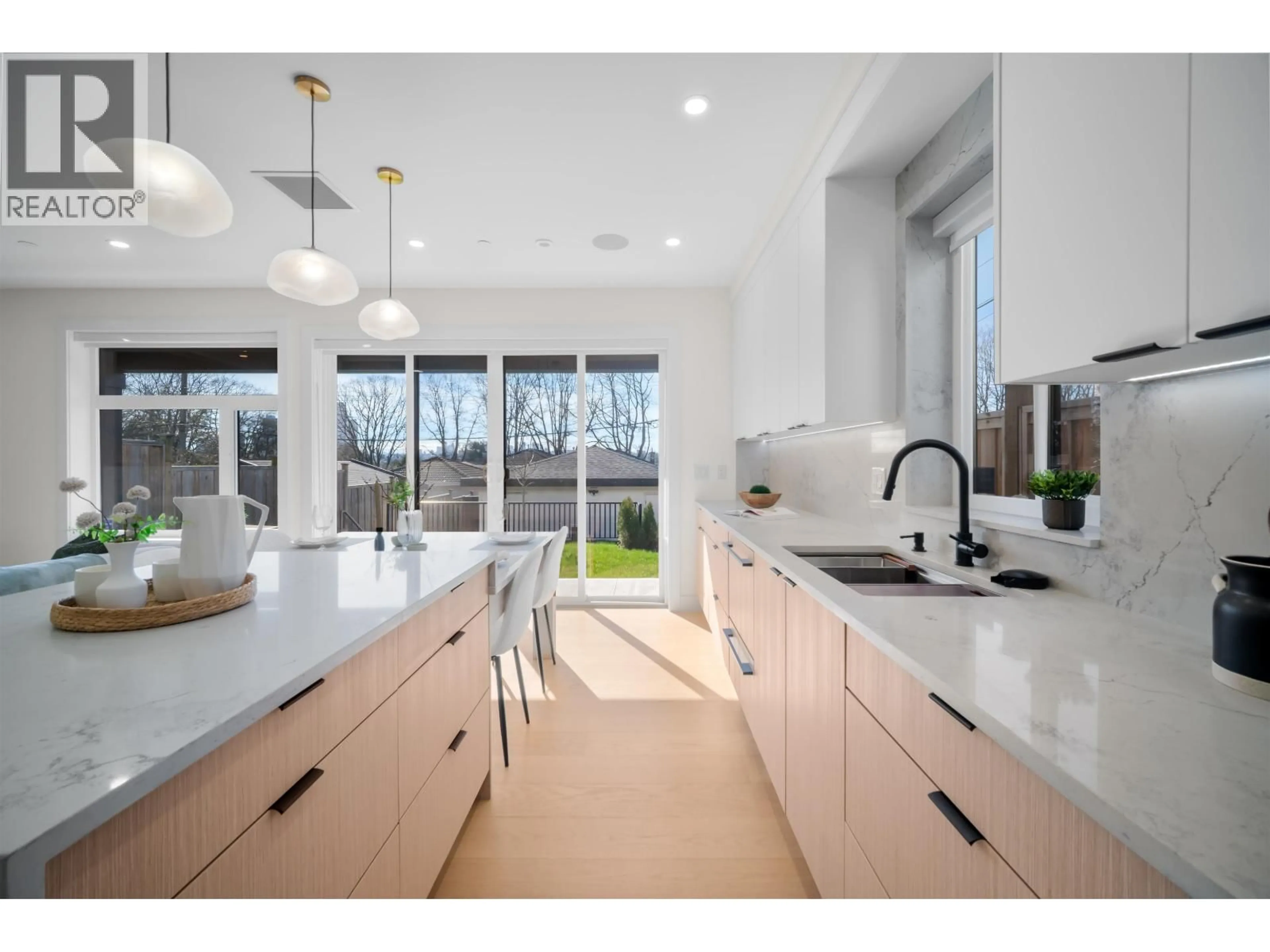 Open concept kitchen, ceramic/tile floor for 2 - 3576 PENDER STREET, Vancouver British Columbia V5K2E3