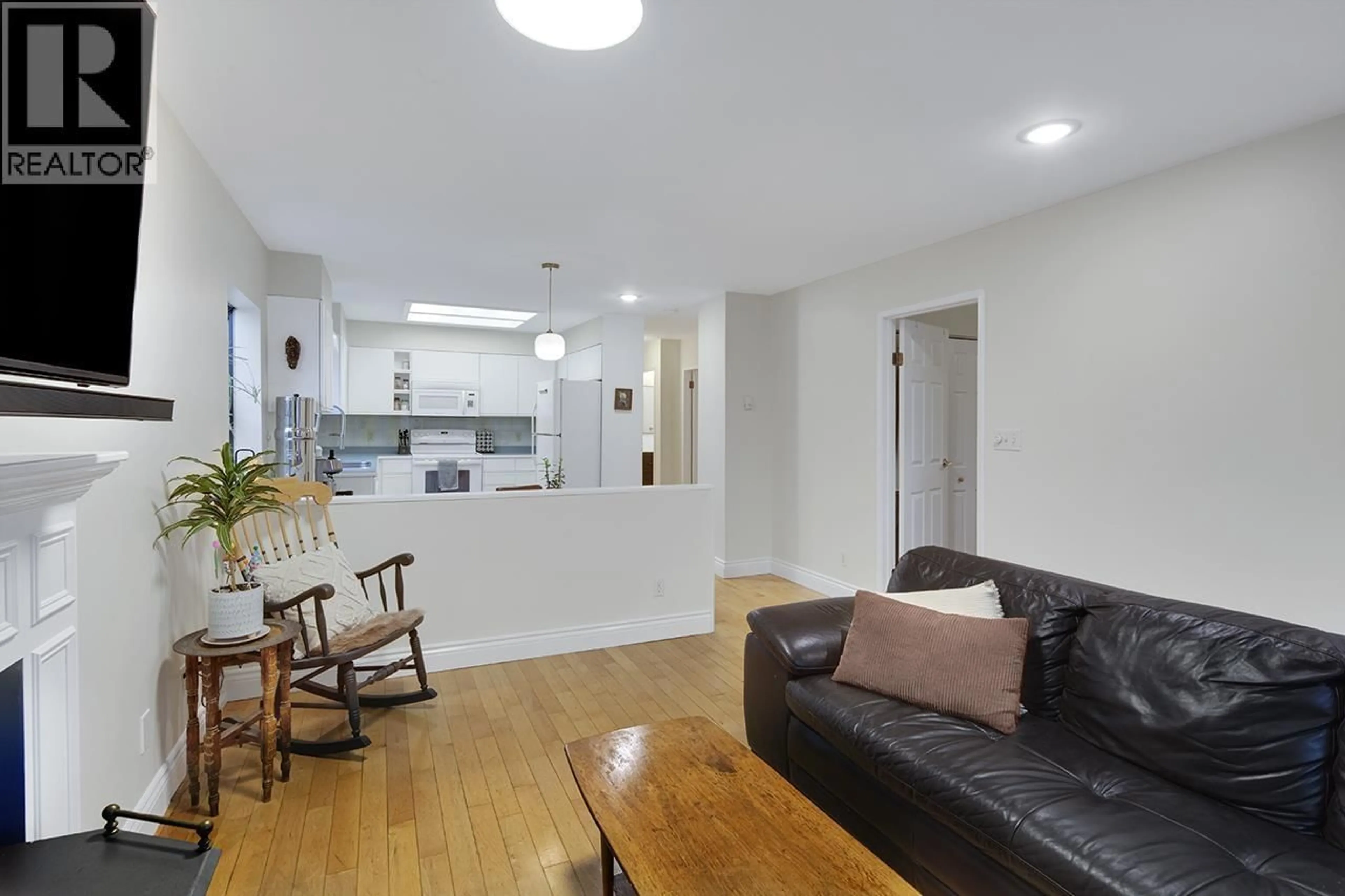 Living room with furniture, wood/laminate floor for 1736 LANGAN AVENUE, Port Coquitlam British Columbia V3C1K7