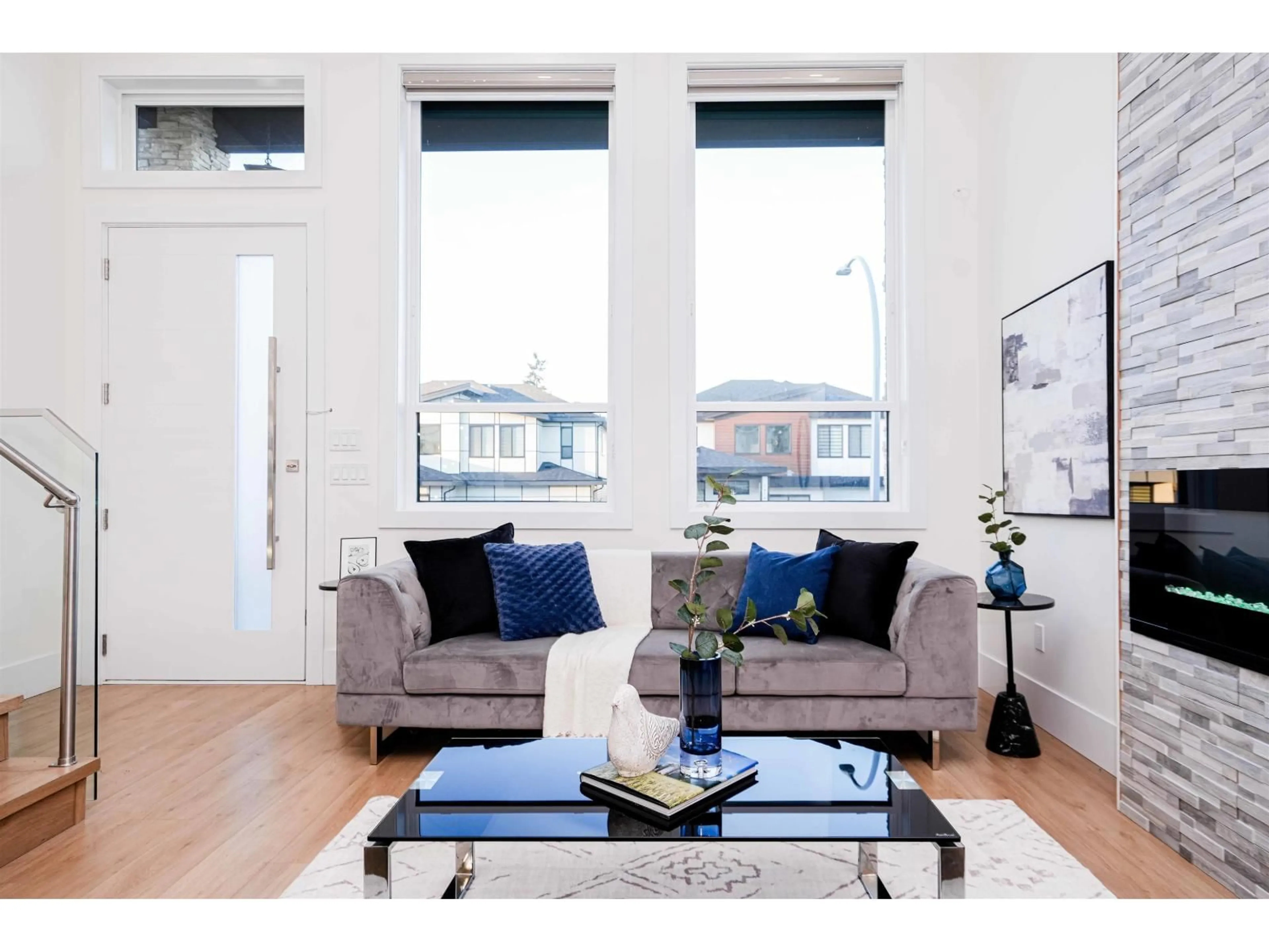 Living room with furniture, wood/laminate floor for 14742 62A AVENUE, Surrey British Columbia V3S2W9