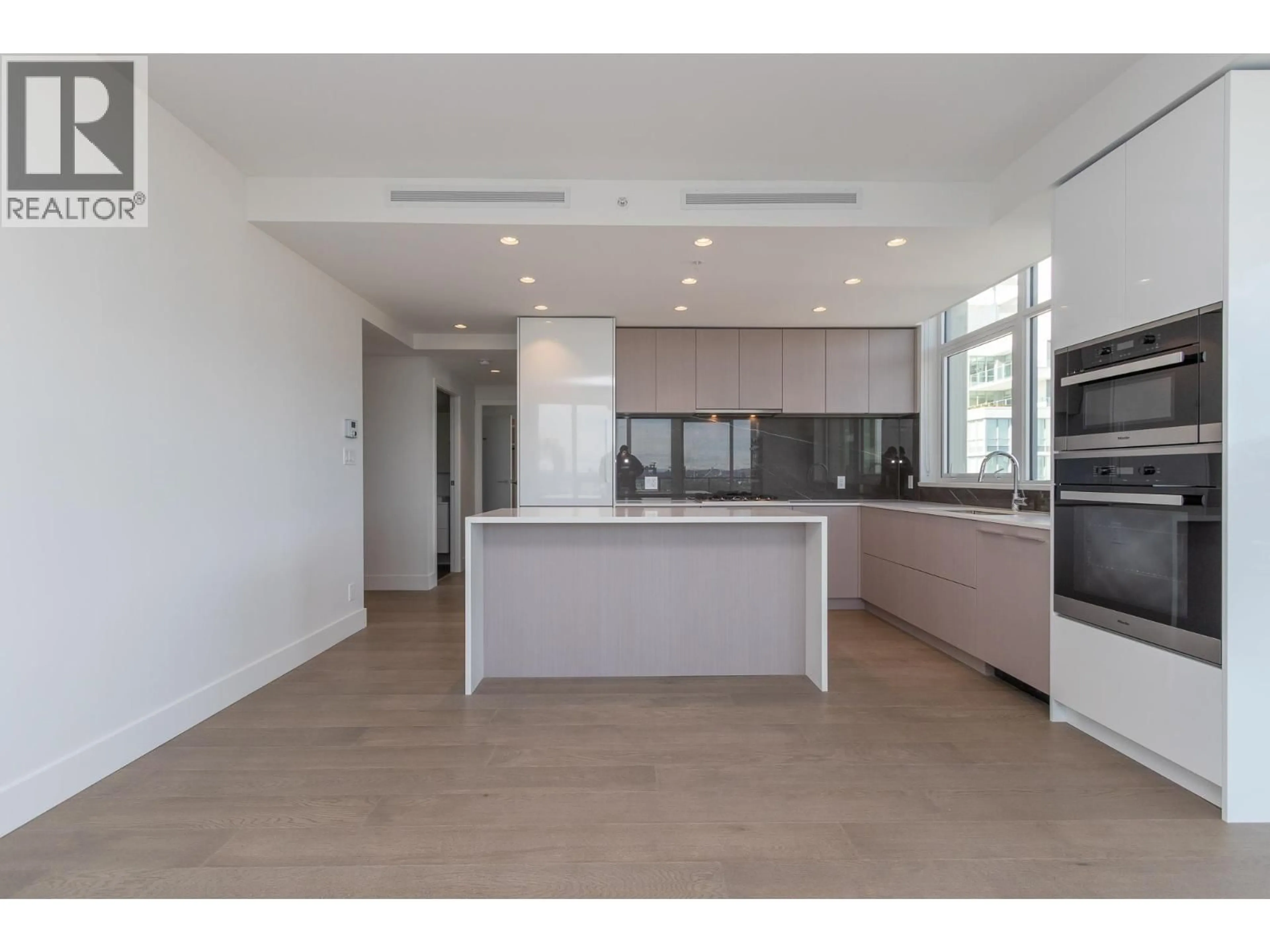 Open concept kitchen, unknown for 1701 - 1632 LIONS GATE LANE, North Vancouver British Columbia V7P0E2