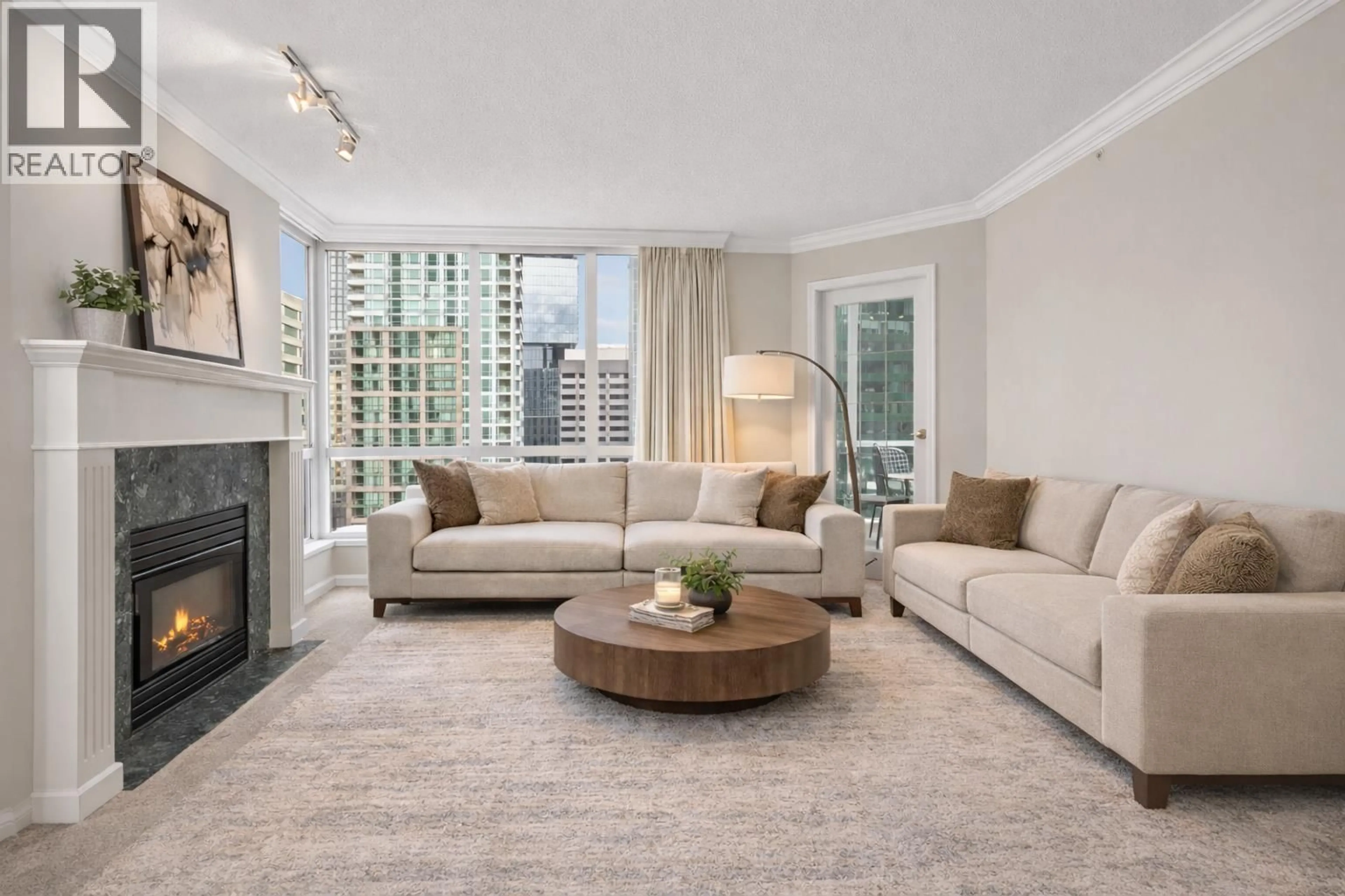 Living room with furniture, carpet floor for 1003 - 1111 HARO STREET, Vancouver British Columbia V6E1E3