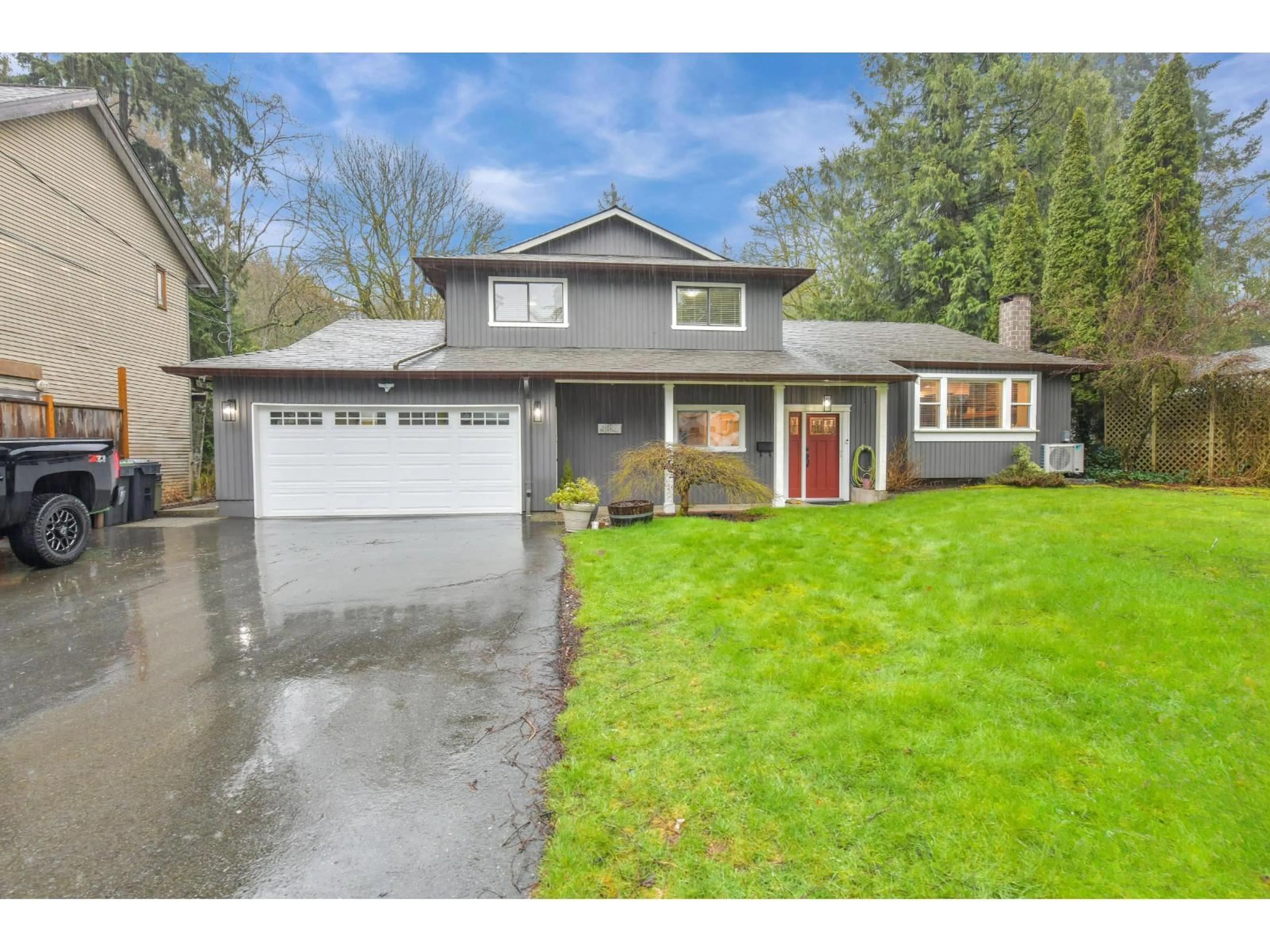 Home with vinyl exterior material, street for 19824 40A AVENUE, Langley British Columbia V3A2Y4