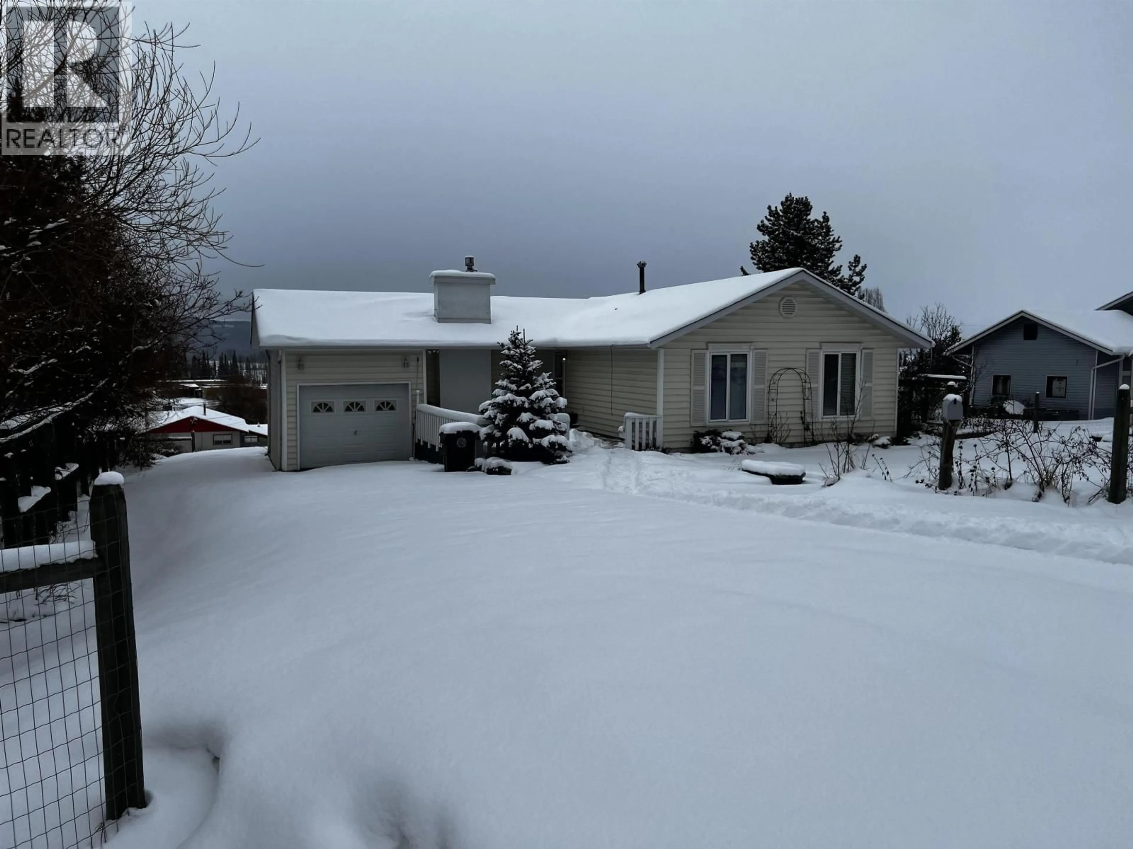 A pic from outside/outdoor area/front of a property/back of a property/a pic from drone, street for 22 REGAN STREET, Granisle British Columbia V0J1W0