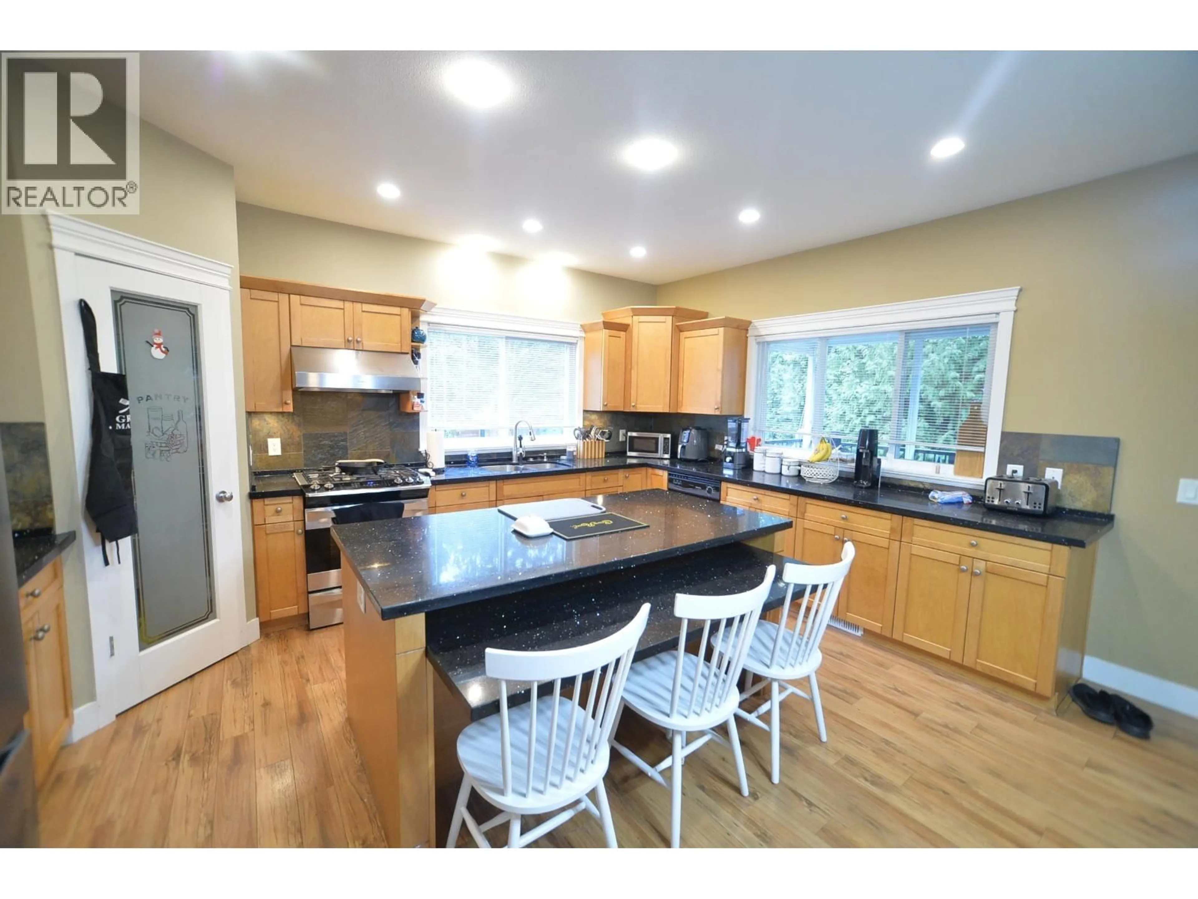 Open concept kitchen, wood/laminate floor for 23161 123 AVENUE, Maple Ridge British Columbia V2X7Y9