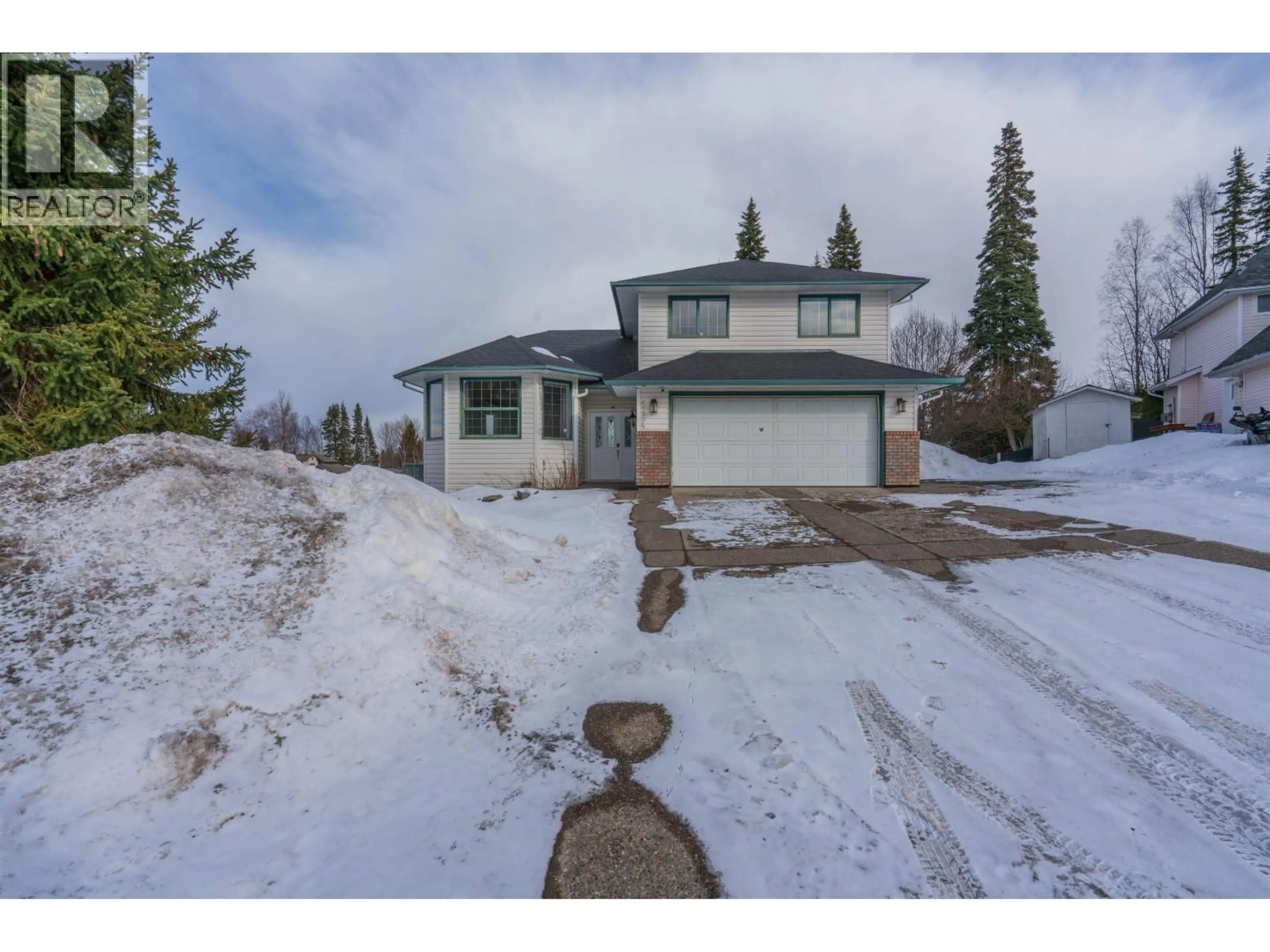 A pic from outside/outdoor area/front of a property/back of a property/a pic from drone, street for 6454 BURKITT ROAD, Prince George British Columbia V2K4S9